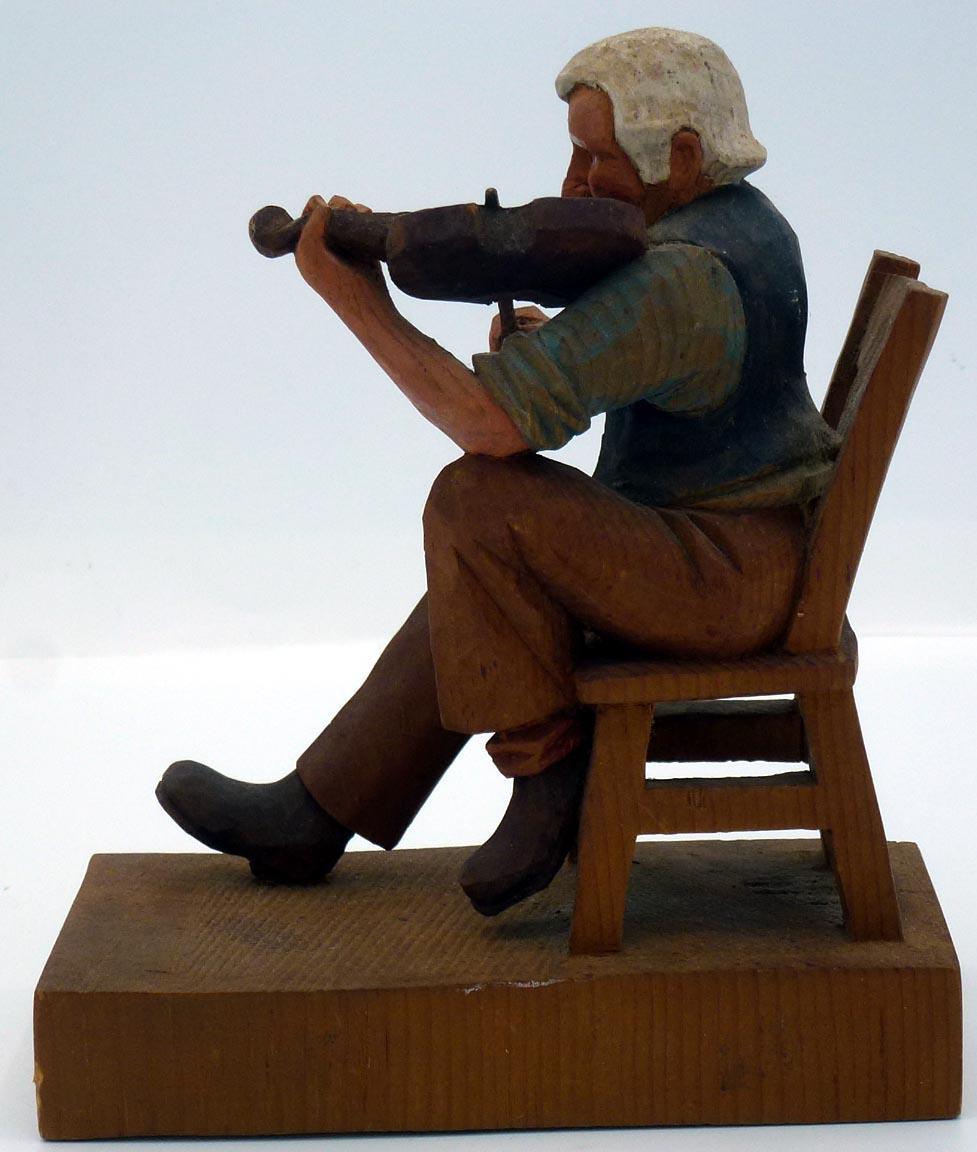 American Folk Art fiddle player with long mustache, playing violin, by Jack Eichbaum.