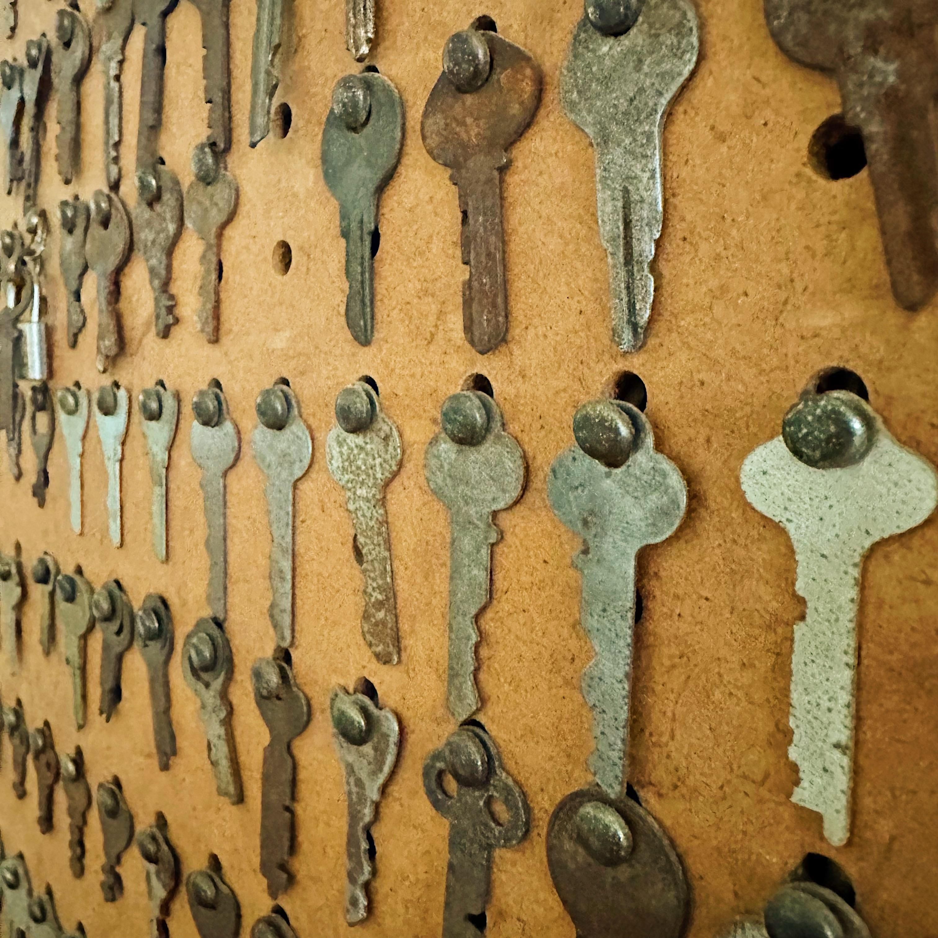 Metal Folk Art Framed Vintage Keys on PegBoard For Sale