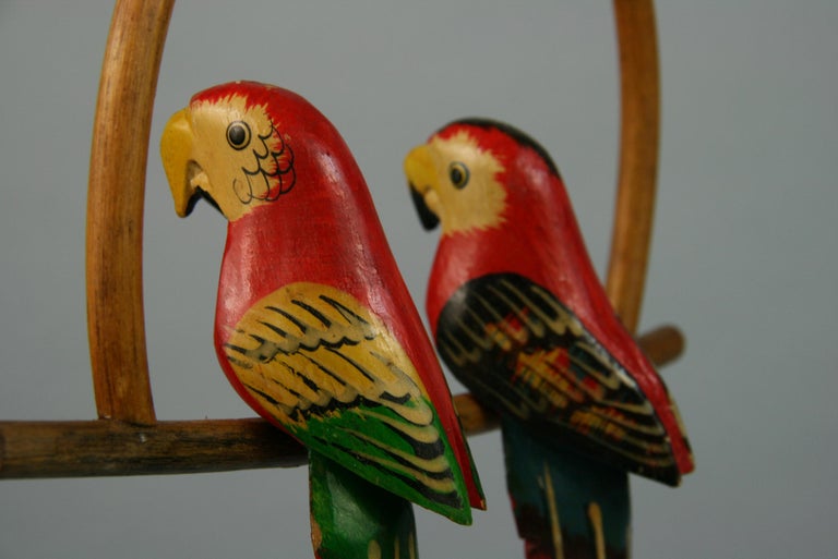 Mid-20th Century Folk Art Hand Carved and Painted Pair Red Parrots Sculptures on a Swing For Sale