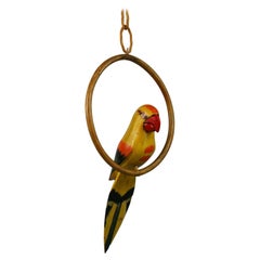 Vintage Folk Art Hand Carved and Painted Yellow Parrot Sculpture On a Swing