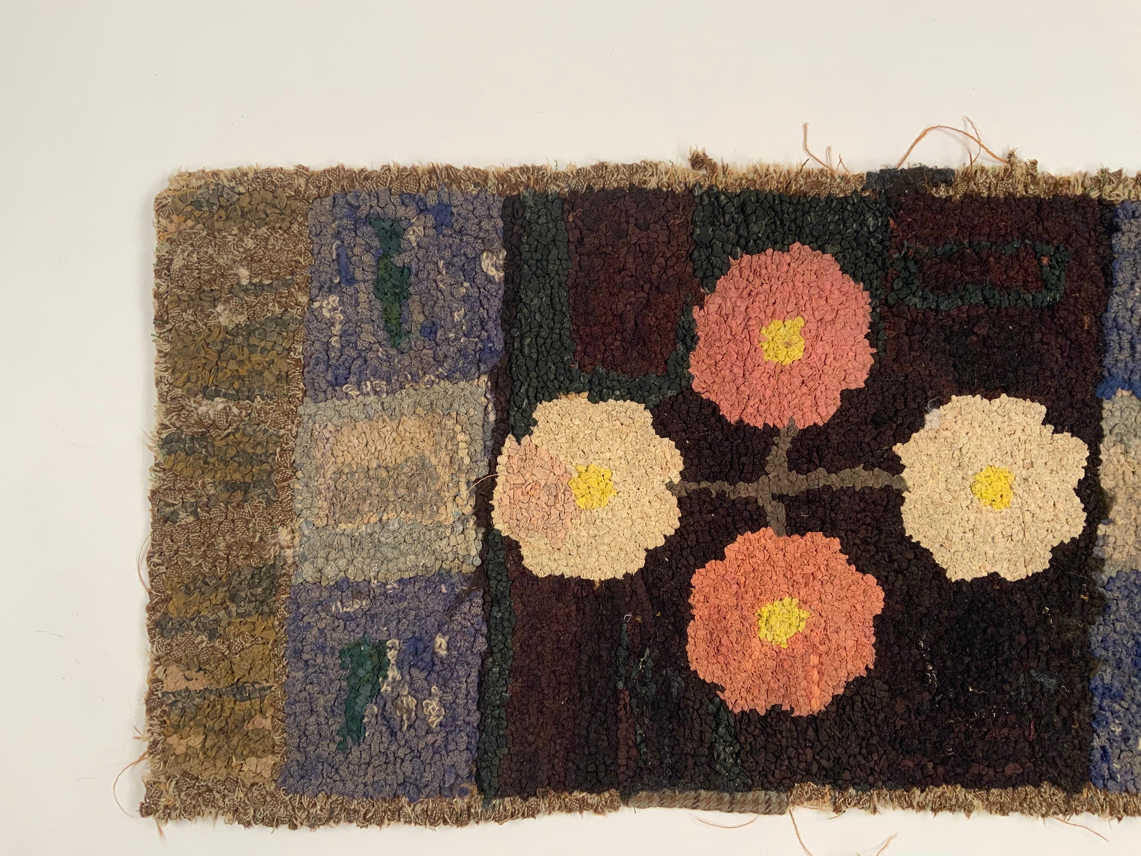 Gorgeous hooked Folk Art rag rug from late 19th/early 20th century. Great colors. Backed in Linen that has deteriorated from age.