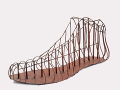 Folk Art iron sculpture, depicting a big shoe. United States early 20th century.