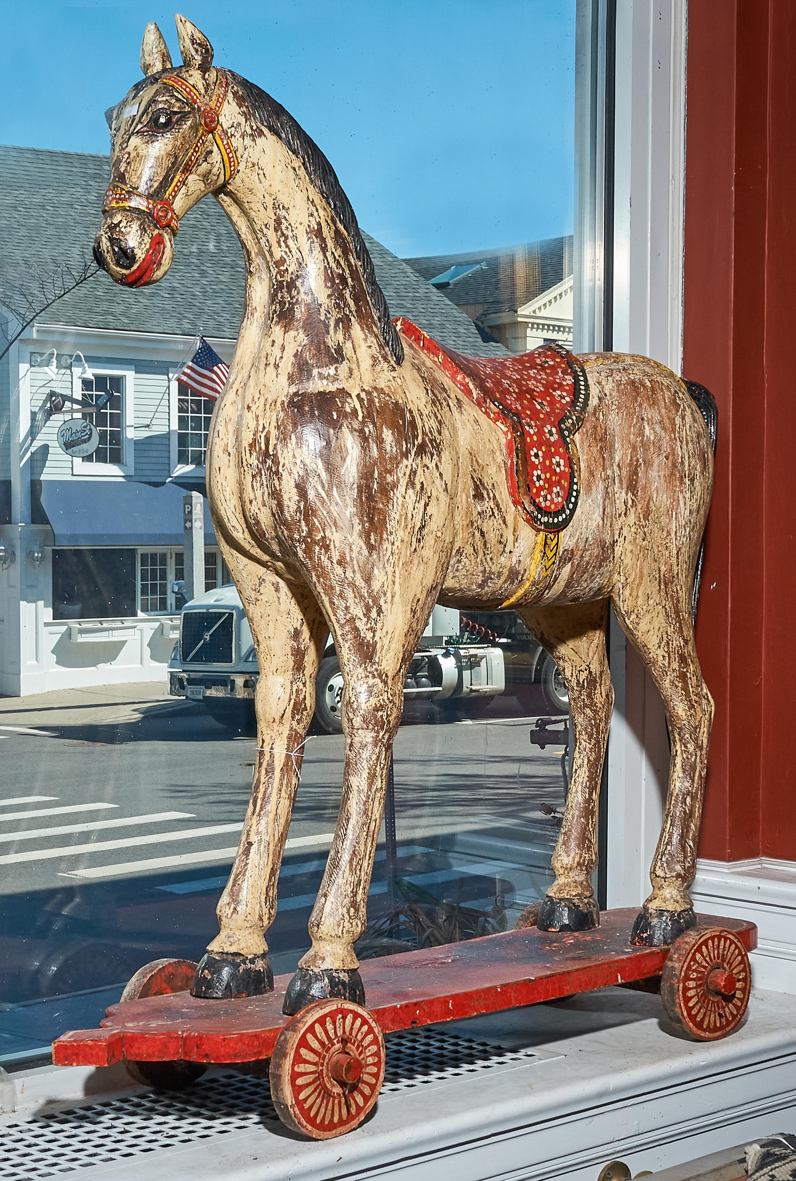 20th Century Folk Art Large Painted Horse on Wheels