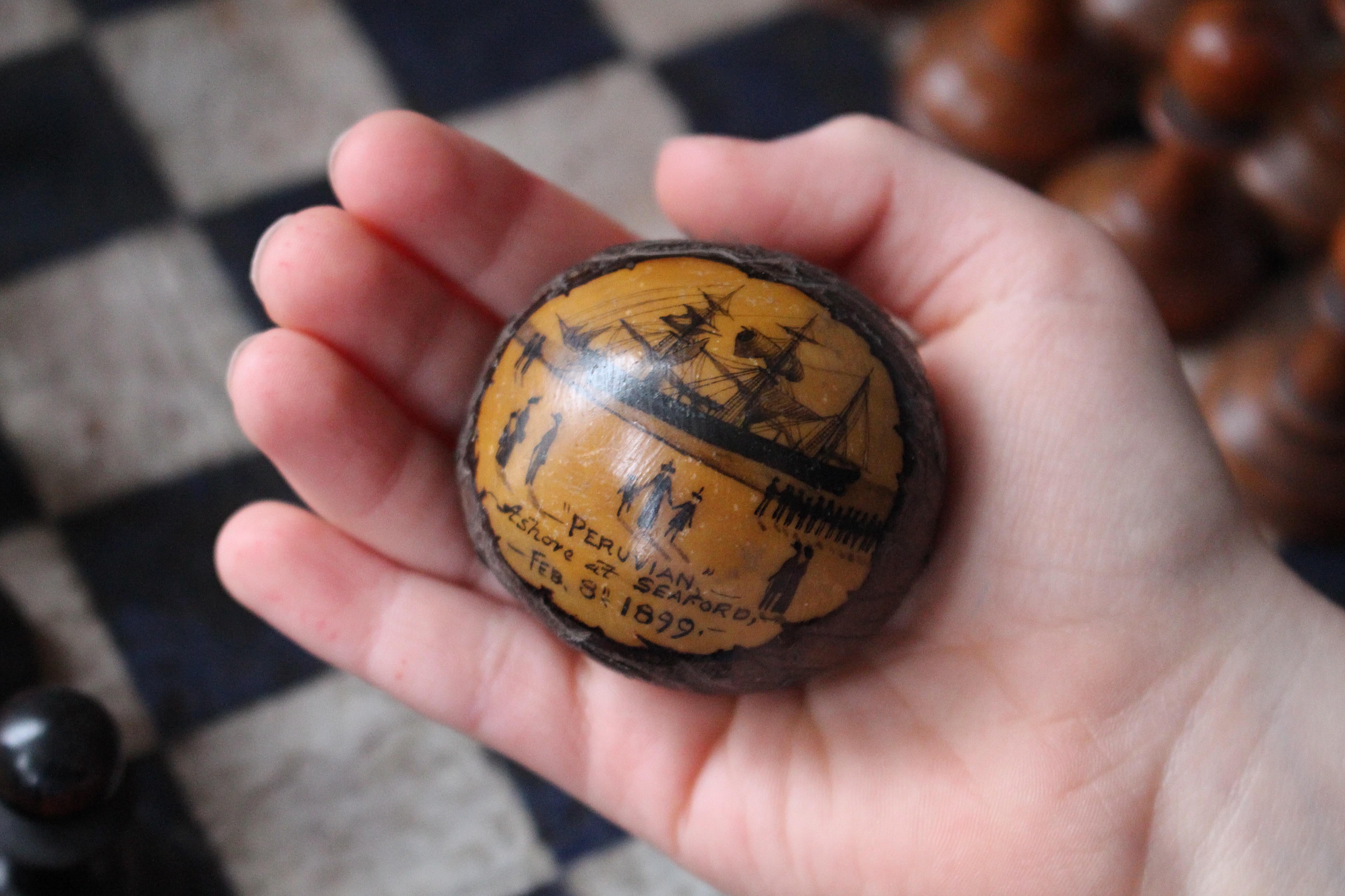 A carved and painted Tagua nut also known as vegetable ivory, the cargo of the Peruvian when it ran aground on the 8th of February 1899 during a vicious storm.

Probably created by H.H.Evans who also produced drawings of the shipwreck, a similar