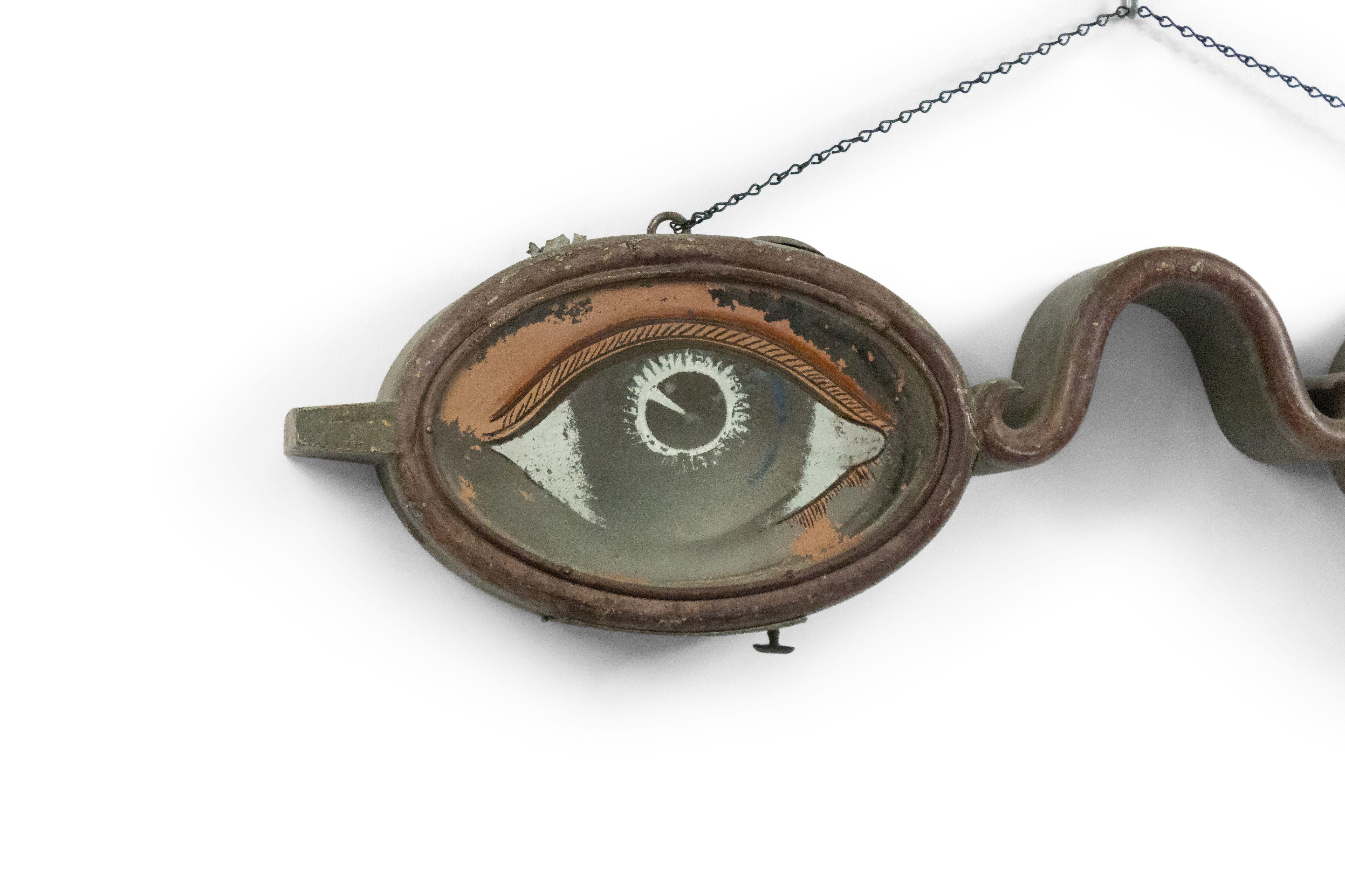 English folk art (19th century) painted tole and glass hanging eye glass trade sign.
 
