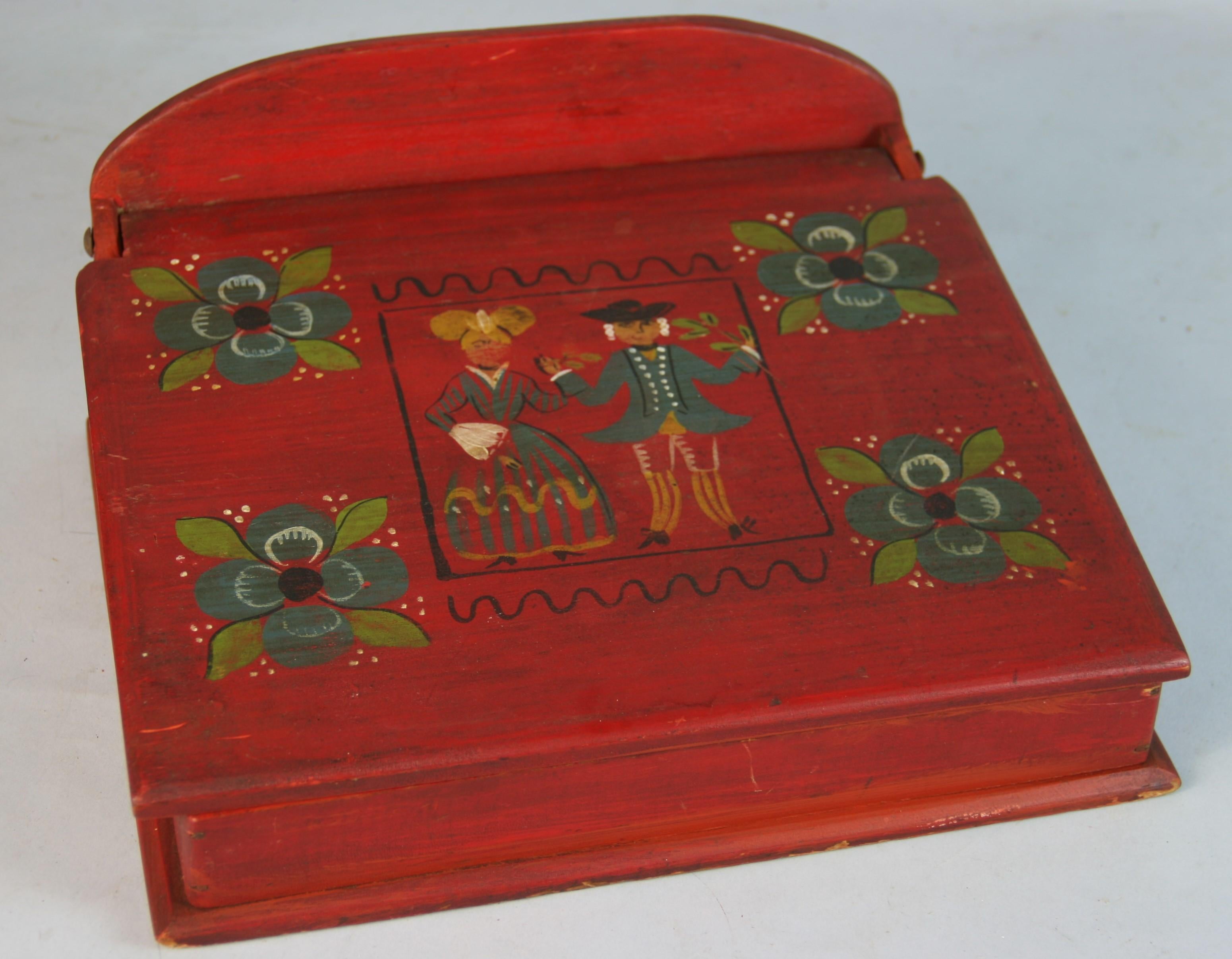 1573 Folk Art hand painted pine stant  lap desk
Hand painted figures and floral design
Pencil compartments and place for note paper and cards