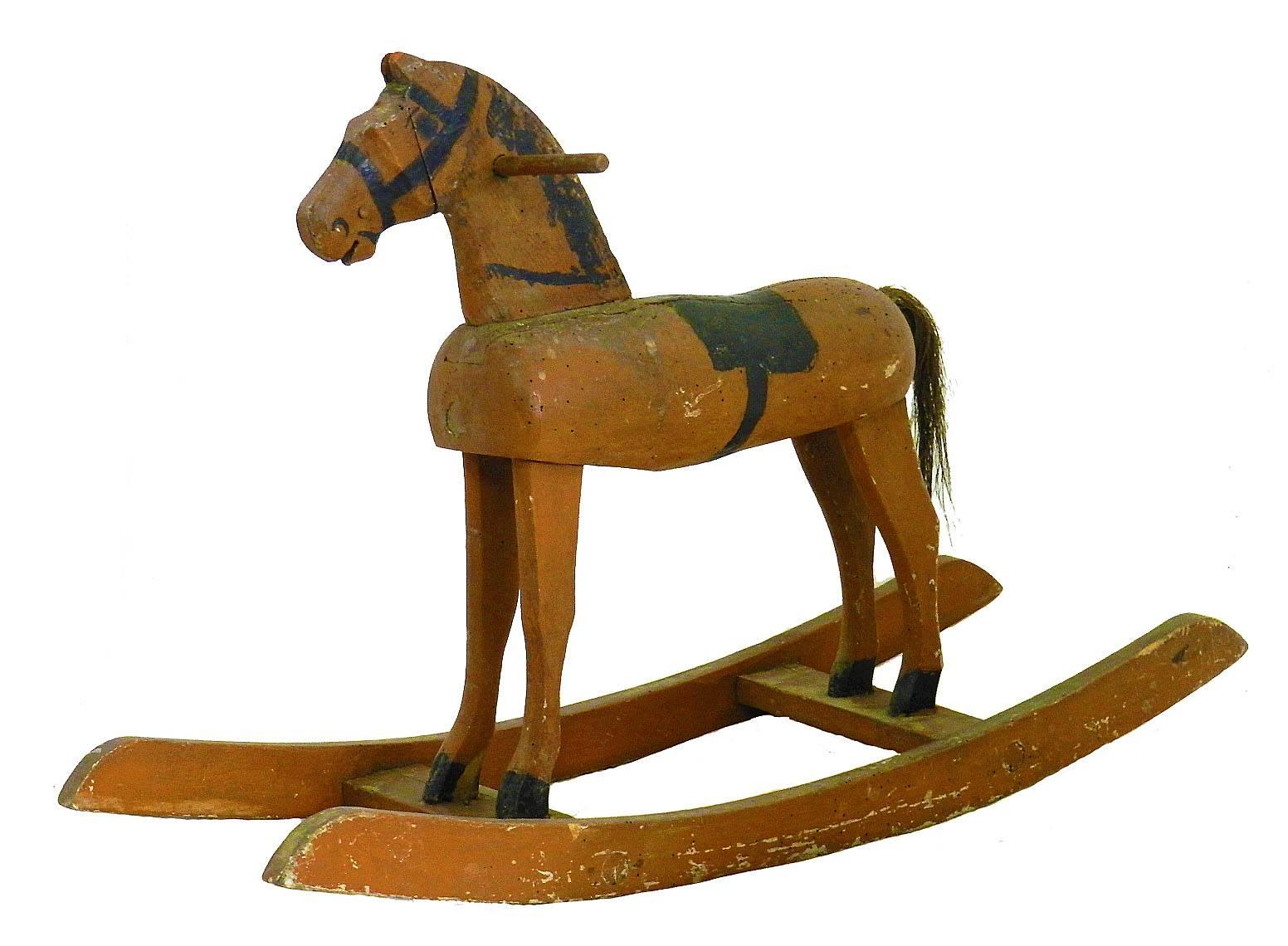 Folk art rocking horse French painted toy, circa 1900.
Charming primitive and naive
Handmade and hand-painted
with old horse hair tail.

 