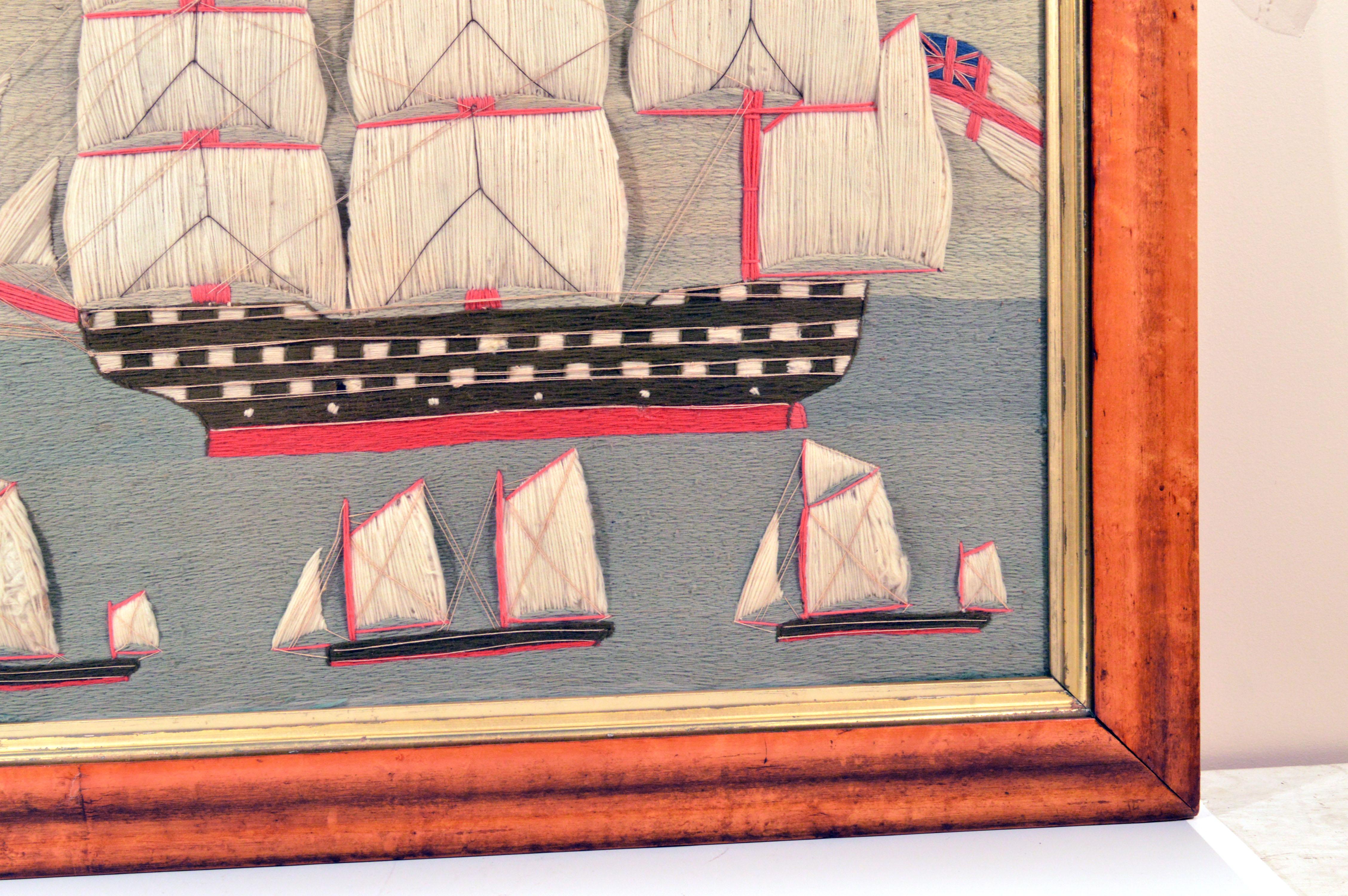 Folk Art Sailor's Woolwork With Trapunto Sails,

The large colorful folky sailor's woolwork or woolie depicts a large square-rigged three-masted first-rate battleship. The sails are depicted trapunto. The hull of the ship in orange as are the masts.