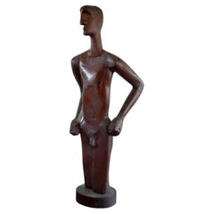 Escultura de arte popular de un hombre