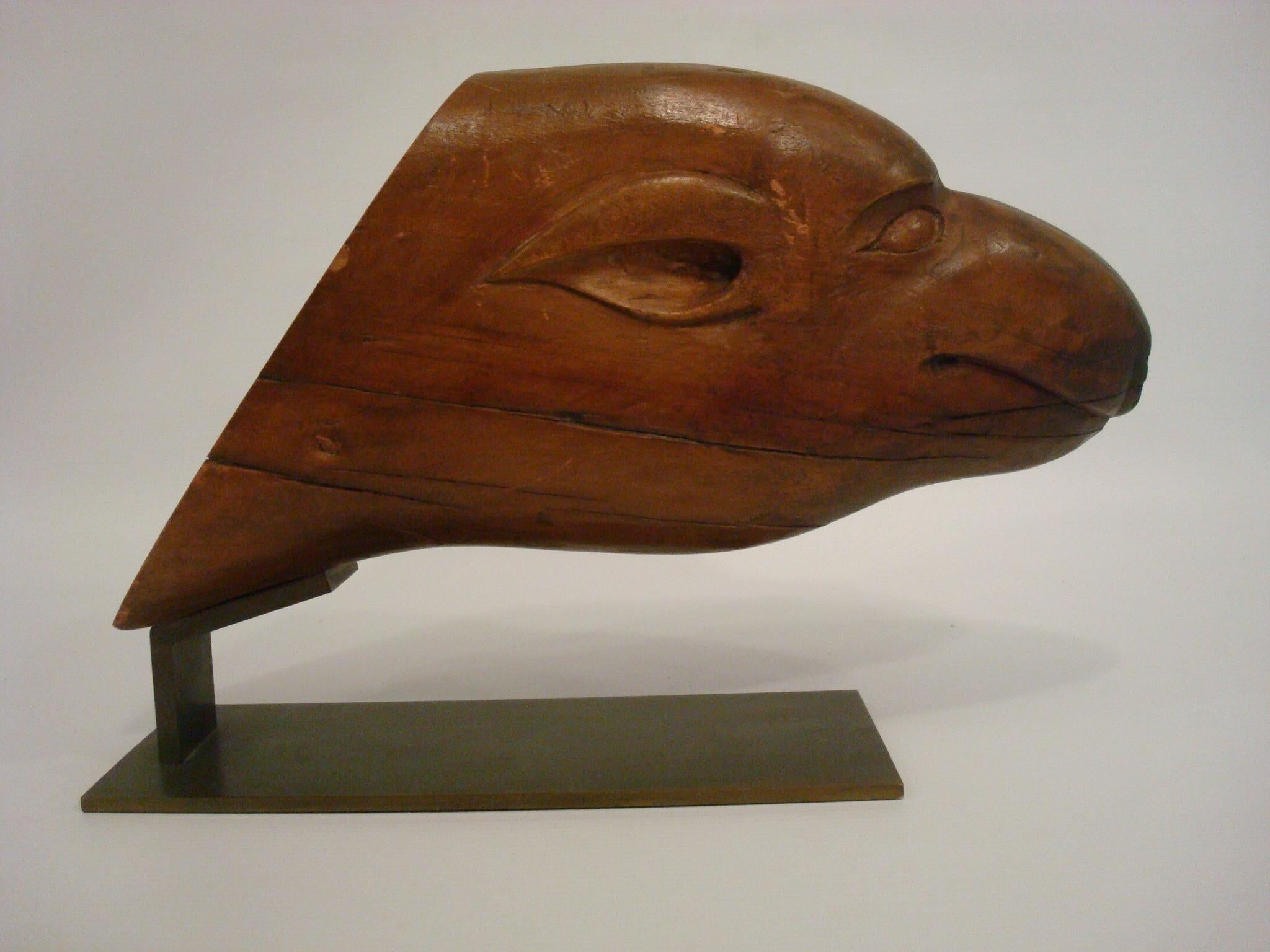 Folk Art sculpture of the head of a seal. South America 1930´s.
The head is mounted over a brass base, as a way to exhibit it.
The head has several crack as you can see on the pictures. Overall very nice age patina.