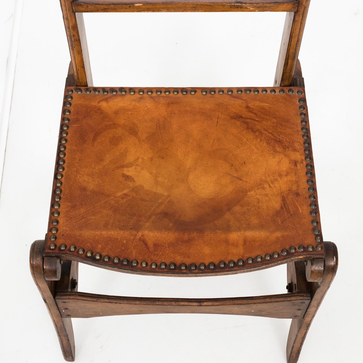 Folk Art chair from England constructed from a box crate with simple, curved back splat and box stretcher, circa early 20th century.