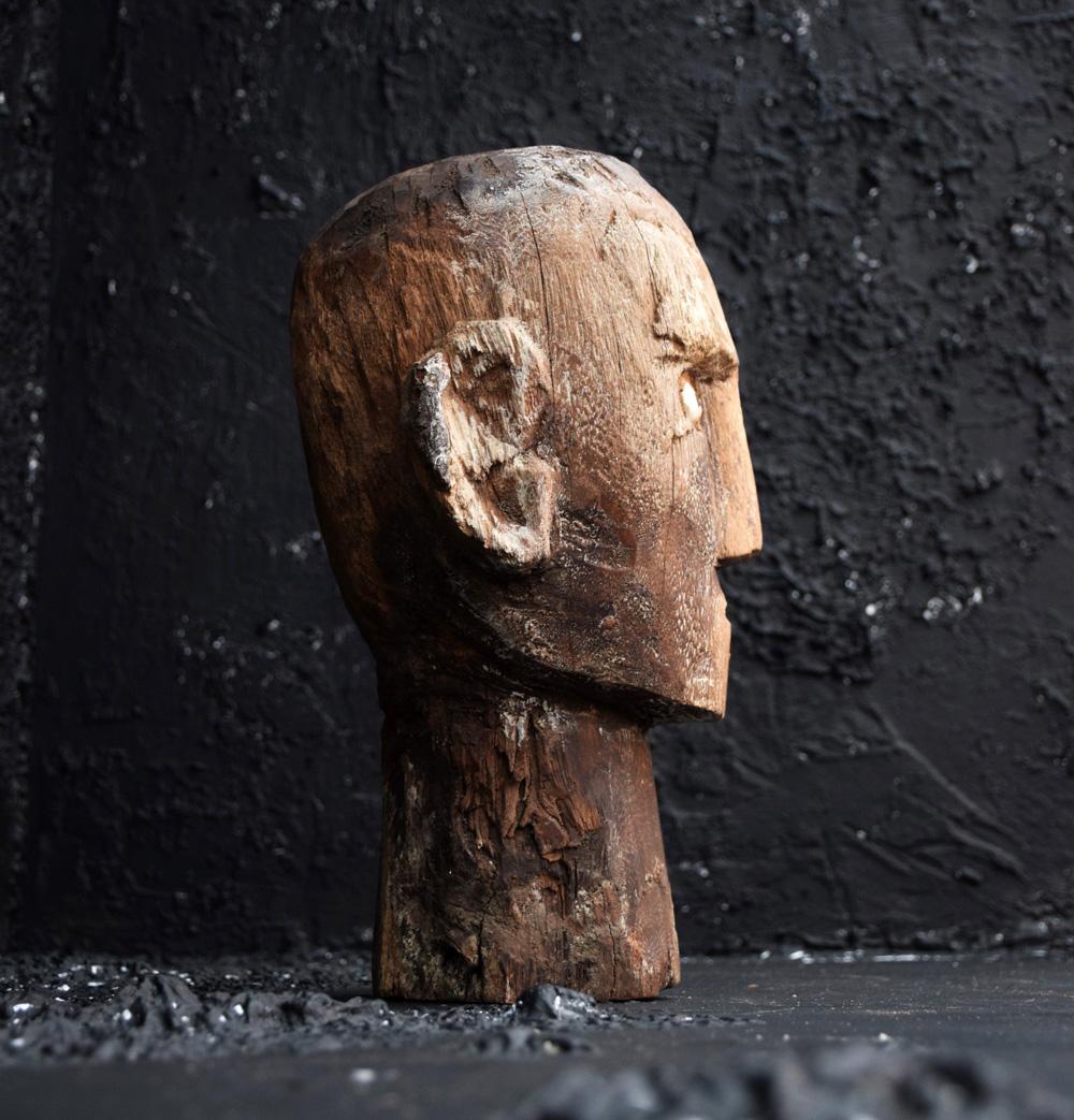 wooden head sculpture