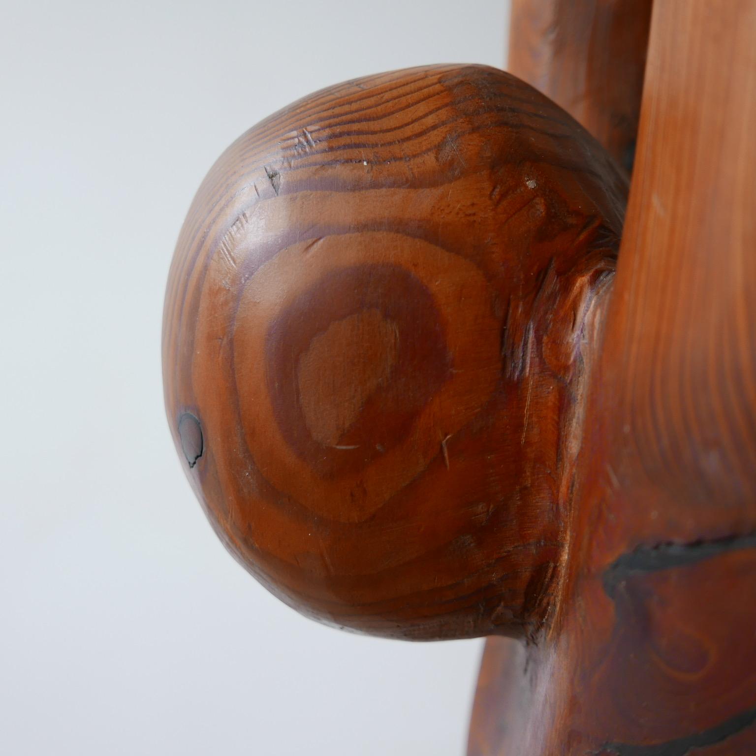 A likely unique midcentury floor lamp.

Formed from a solid carved wood sculptural base with an opaline globe above.

English, circa 1960s.

Likely created by an artist for their own home. It’s not something we have ever come across