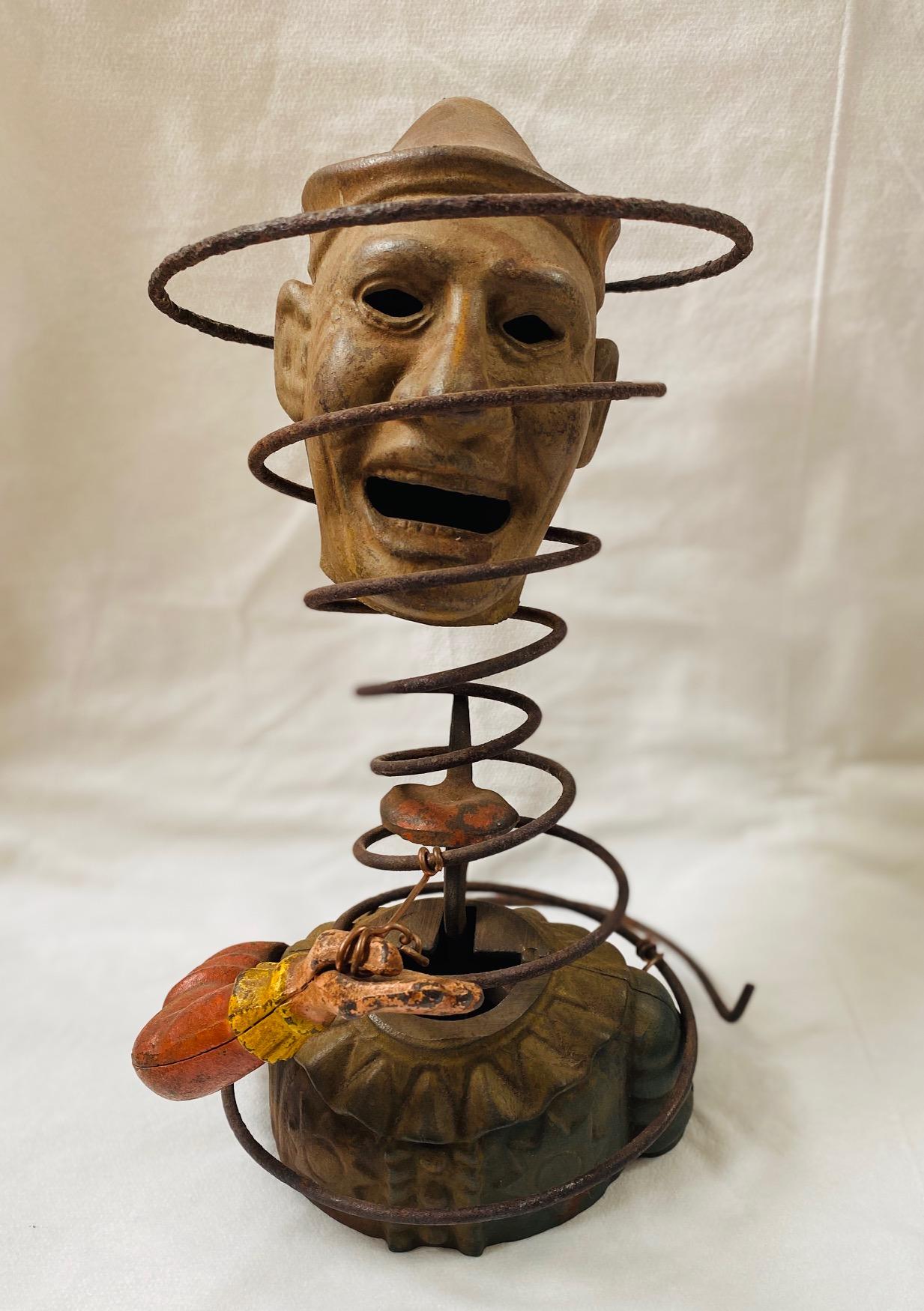 Folk Art up-cycled clown sculpture, 19th and 20th centuries - a clever combination and merging of several old fragments and salvaged material to create a compelling new artwork. The unknown artist took two pieces of a 19th Century Humpty Dumpty