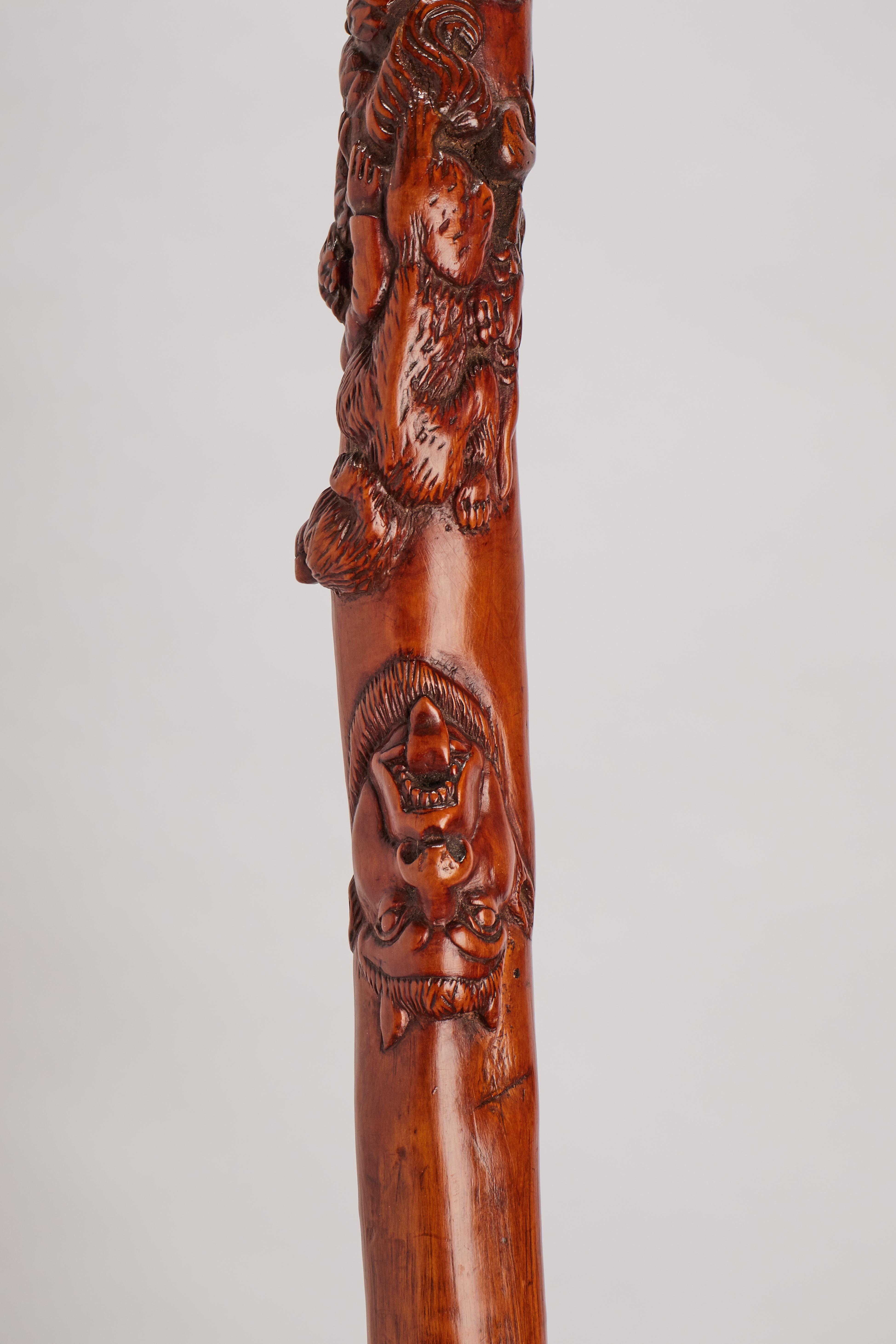 Folk art walking stick depicting a fight between lions. Italy 1840.  For Sale 3