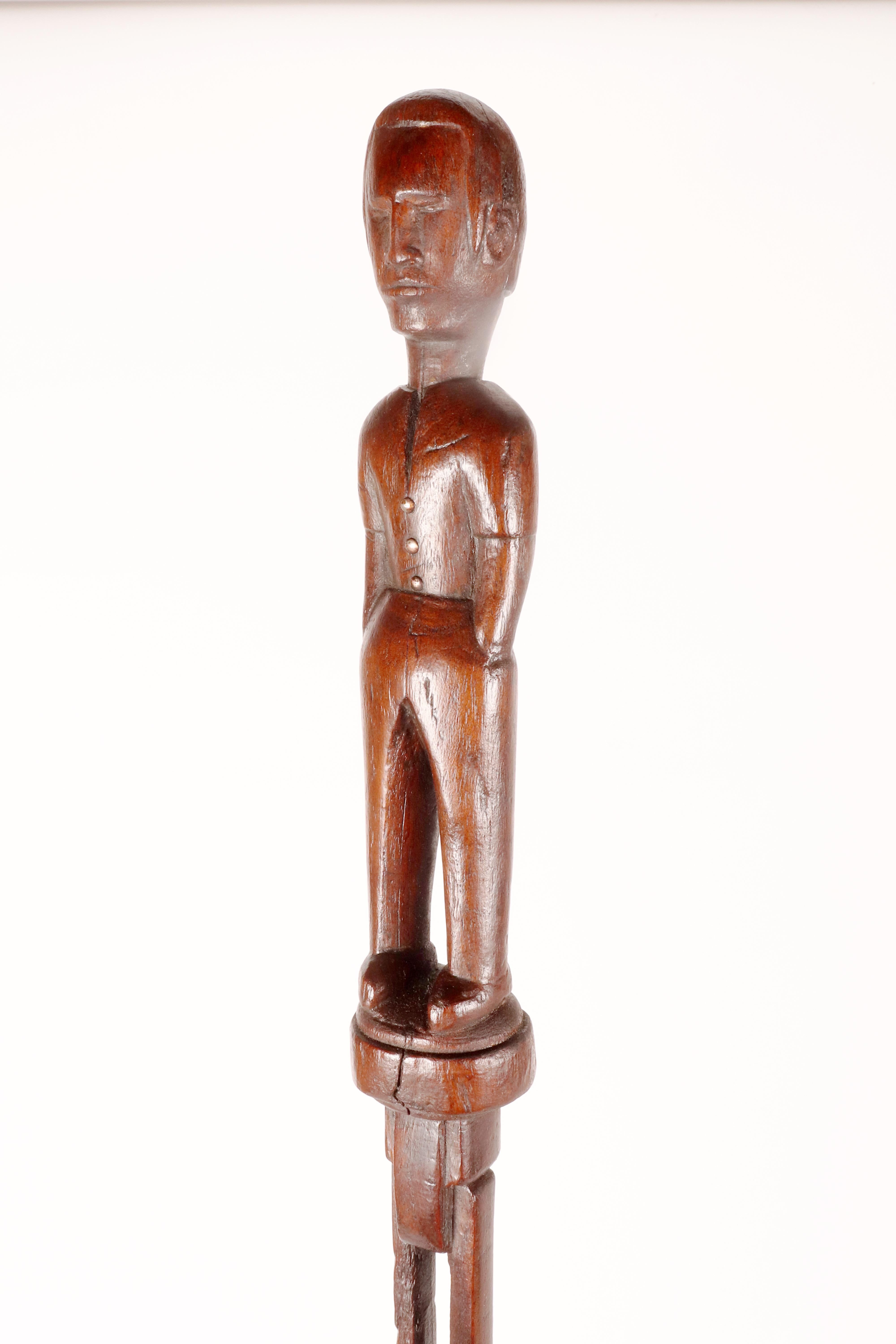 Cuivre Canne d'art populaire représentant un homme sur un manche en forme de chaîne, États-Unis, années 1880. en vente