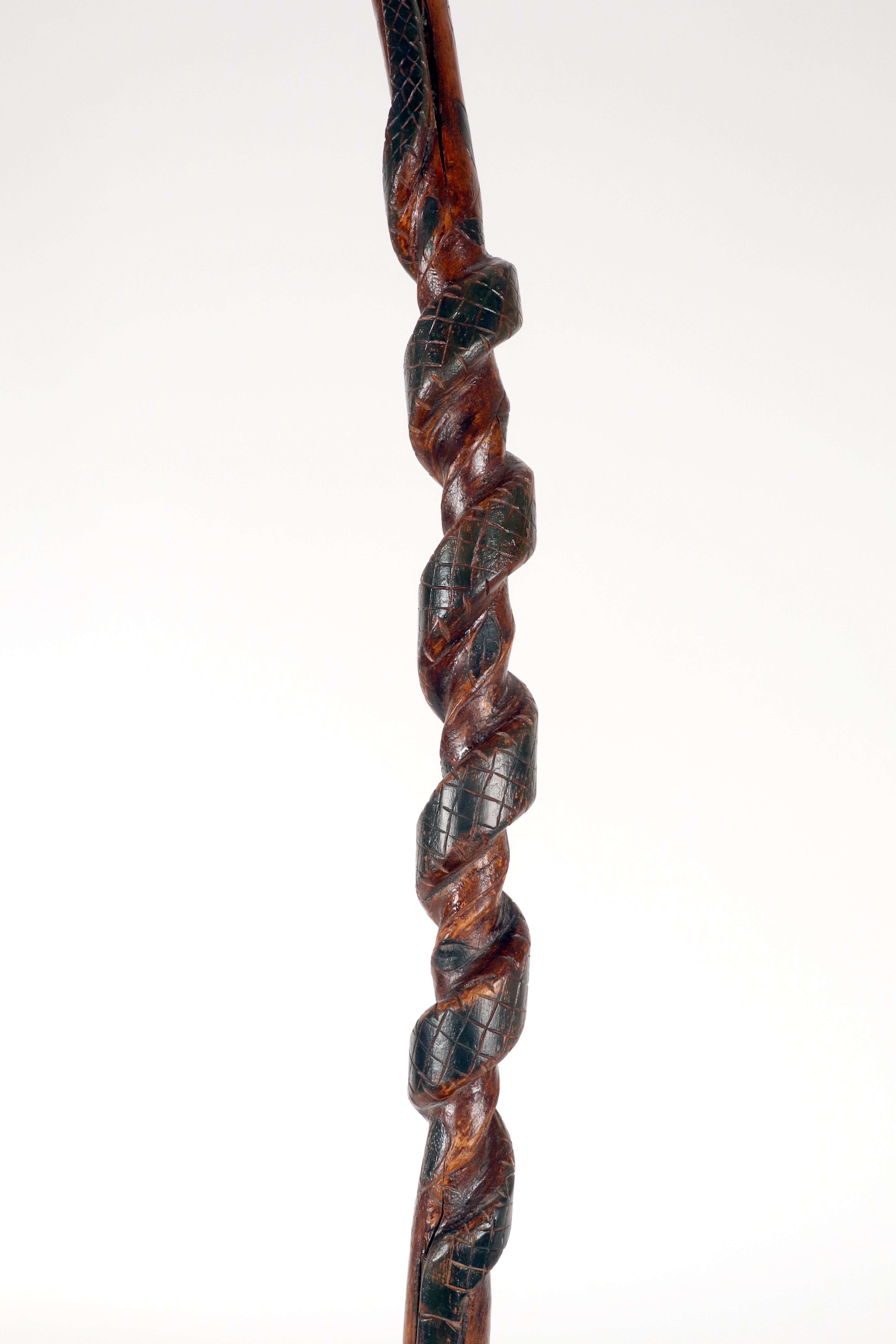 Folk art walking stick depicting a man with a snake. USA circa 1870. For Sale 7