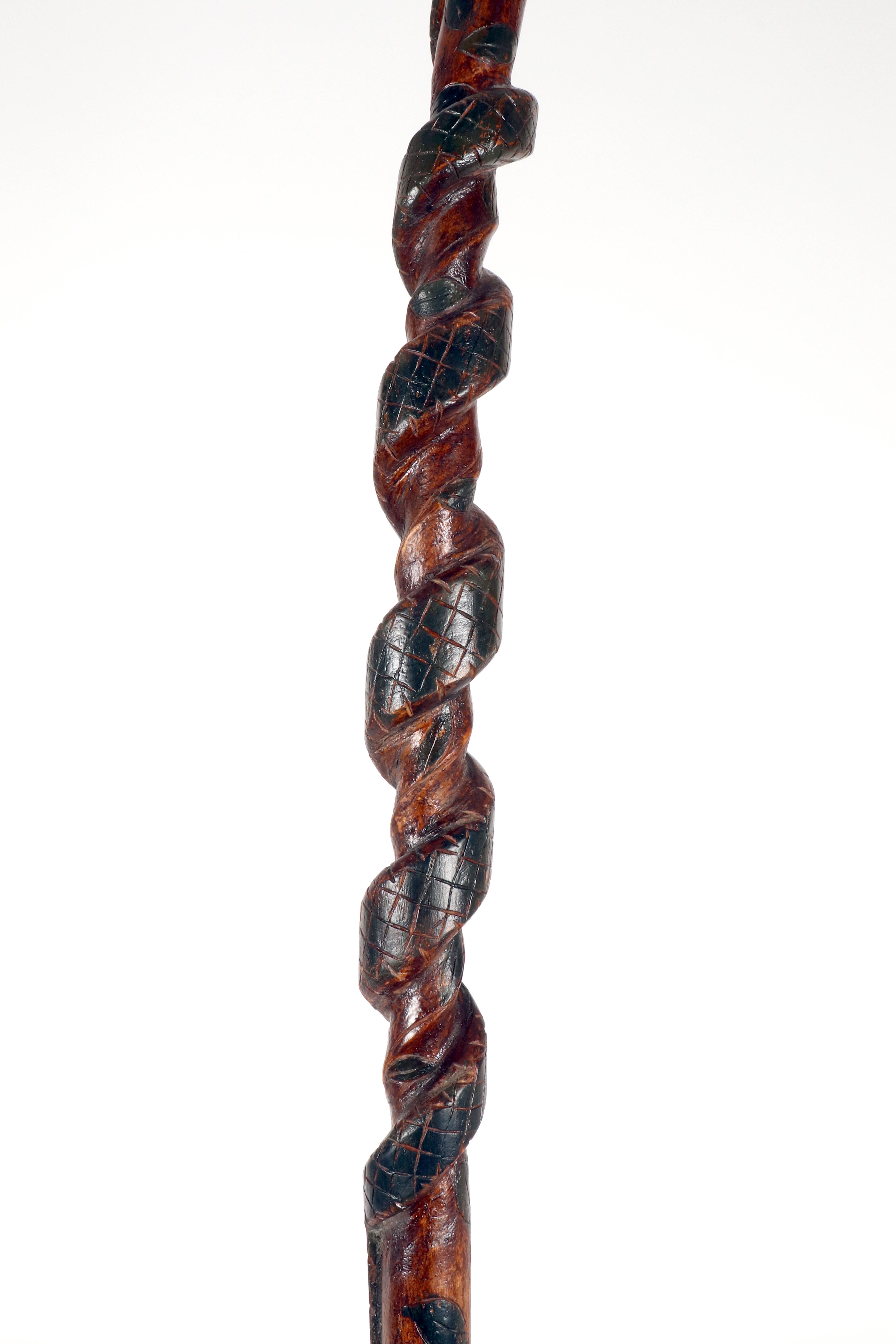Folk art walking stick depicting a man with a snake. USA circa 1870. For Sale 8