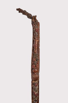Folk art walking stick depicting flowers and characters, Russia 1830.