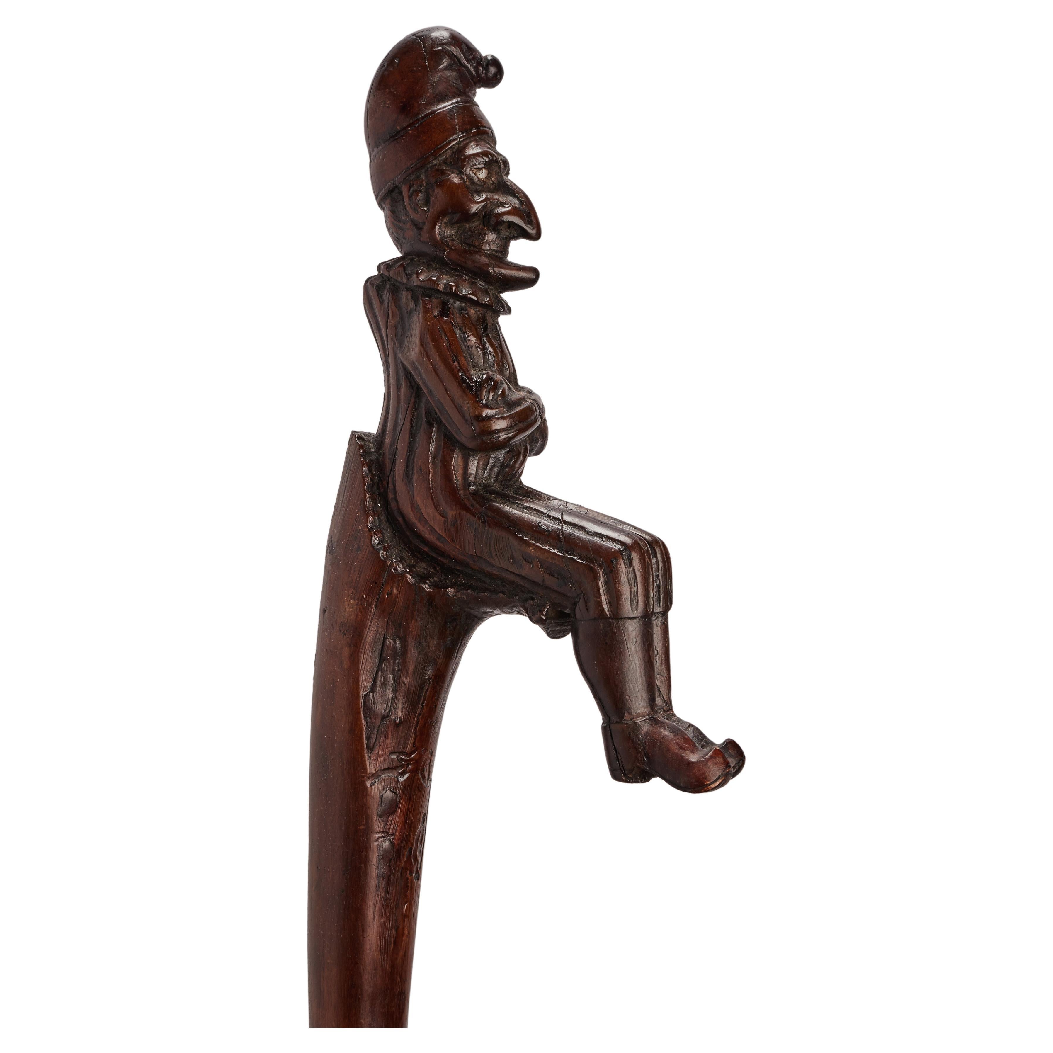 Folk art walking stick depicting Mr. Punch, England 1870.  For Sale