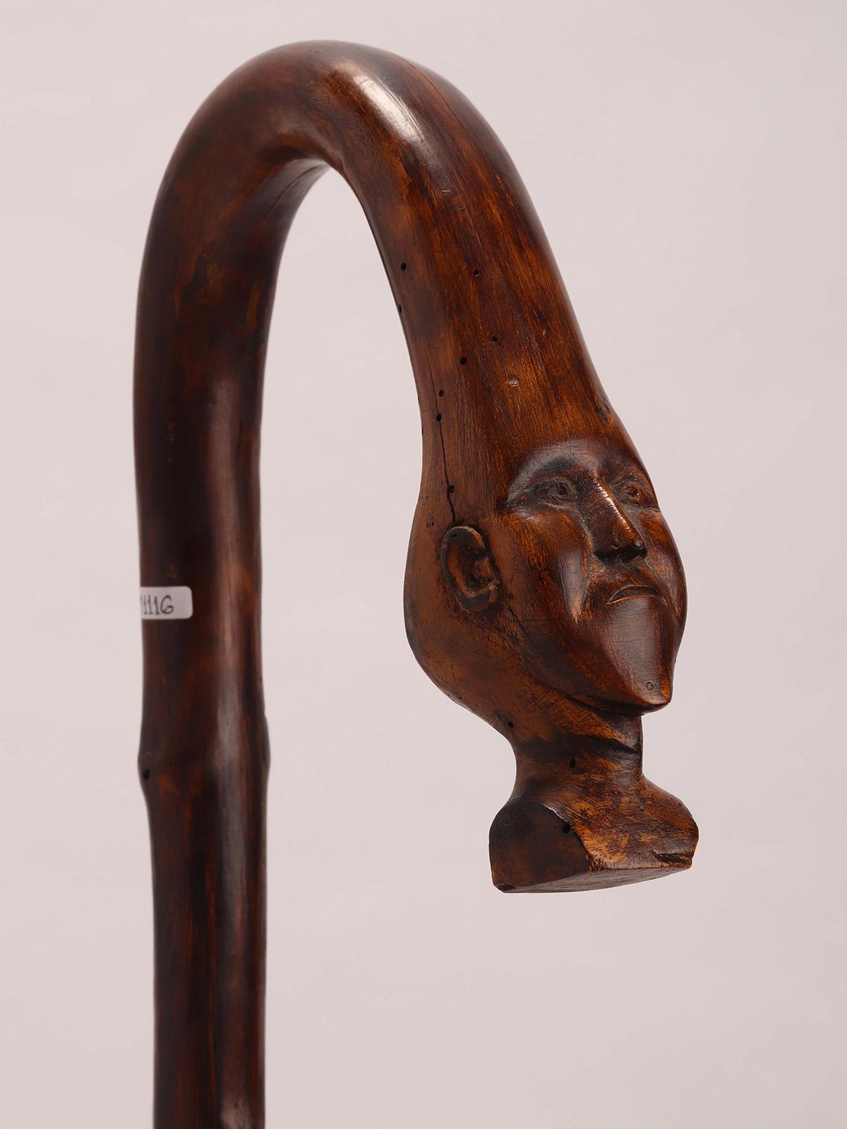 American Folk art  walking stick depicting the head of a man, USA 1880.  For Sale