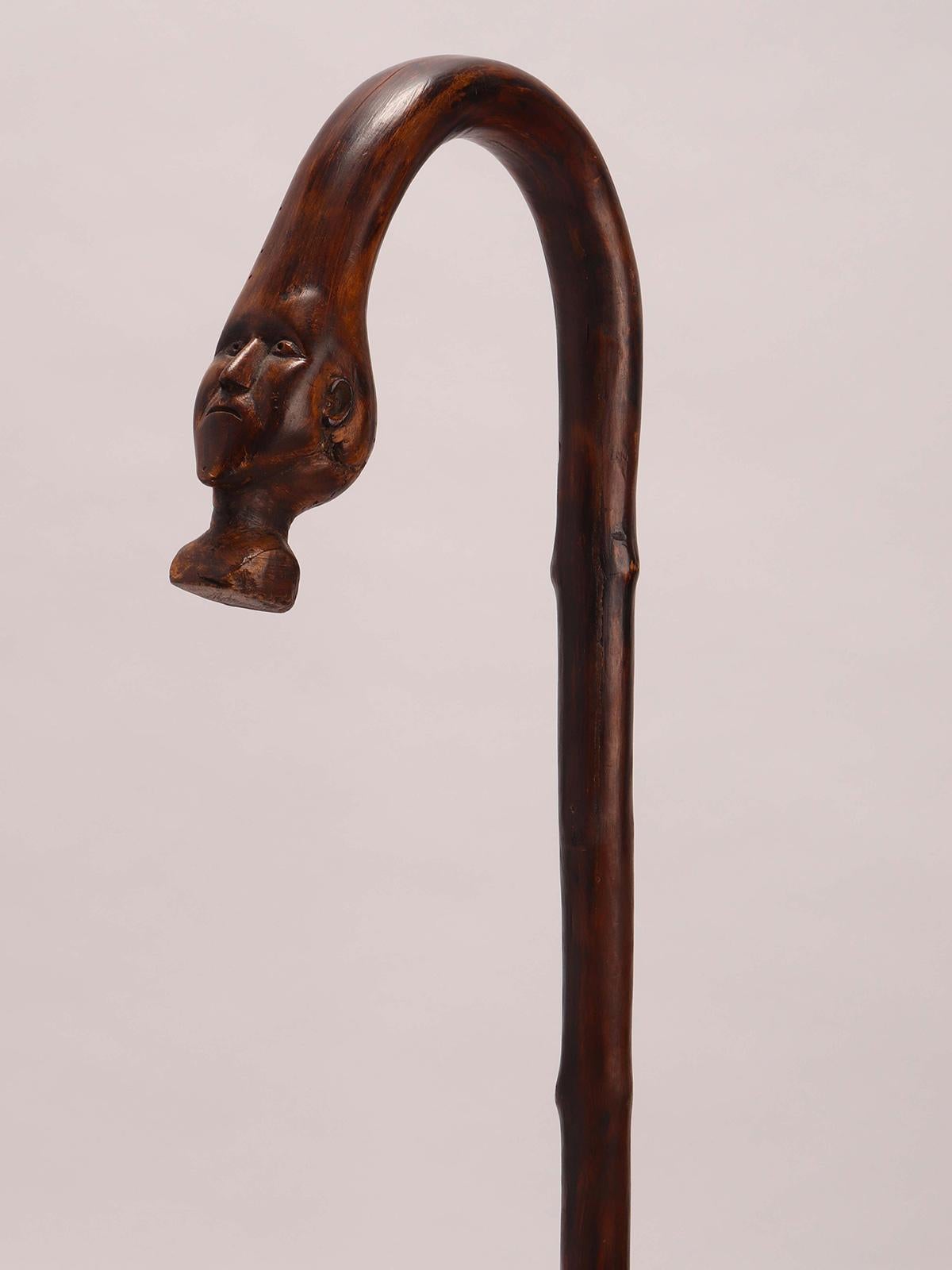 Fruitwood Folk art  walking stick depicting the head of a man, USA 1880.  For Sale