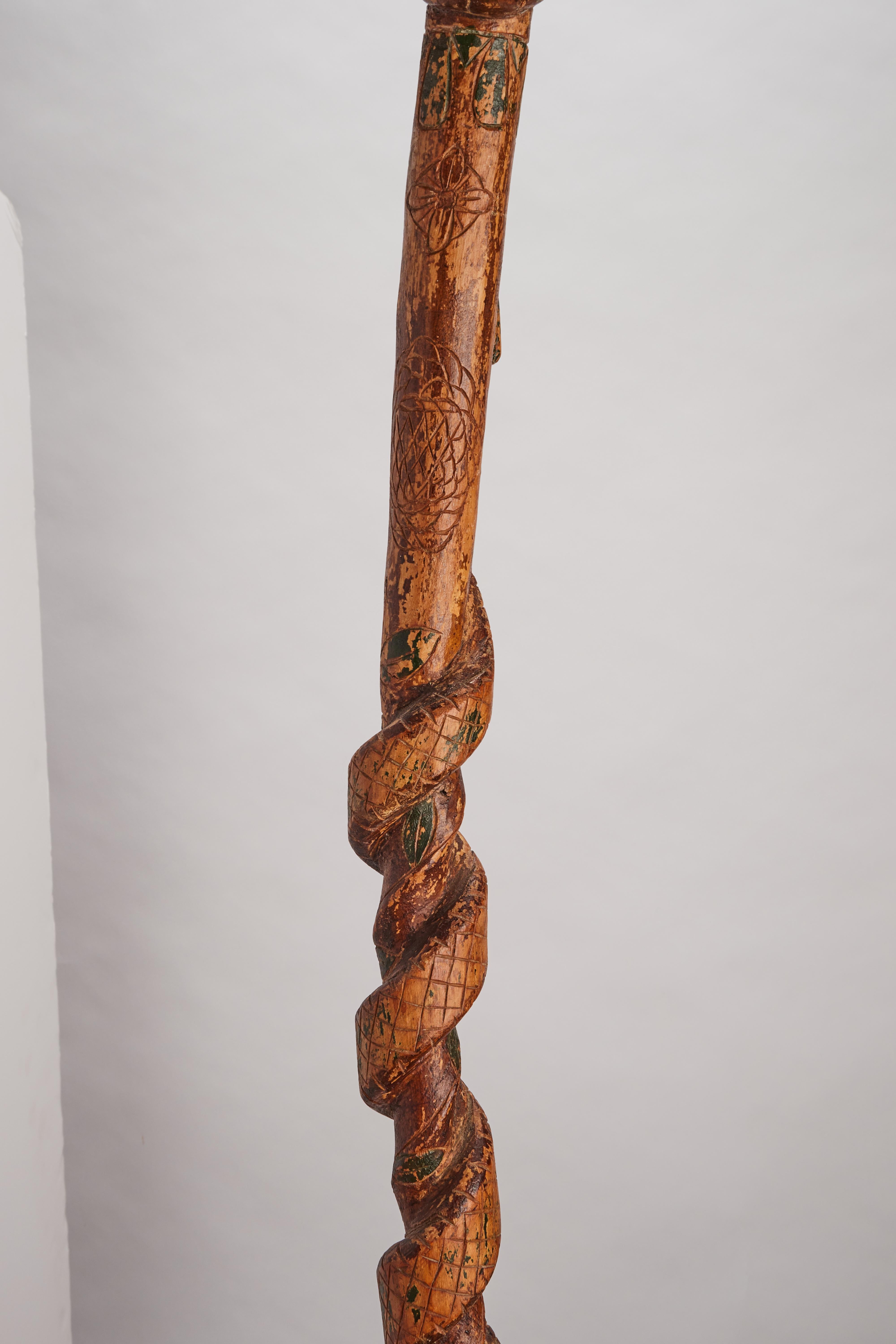 19th Century Folk art  walking stick depicting thehead of a man with a snake, USA 1880. For Sale