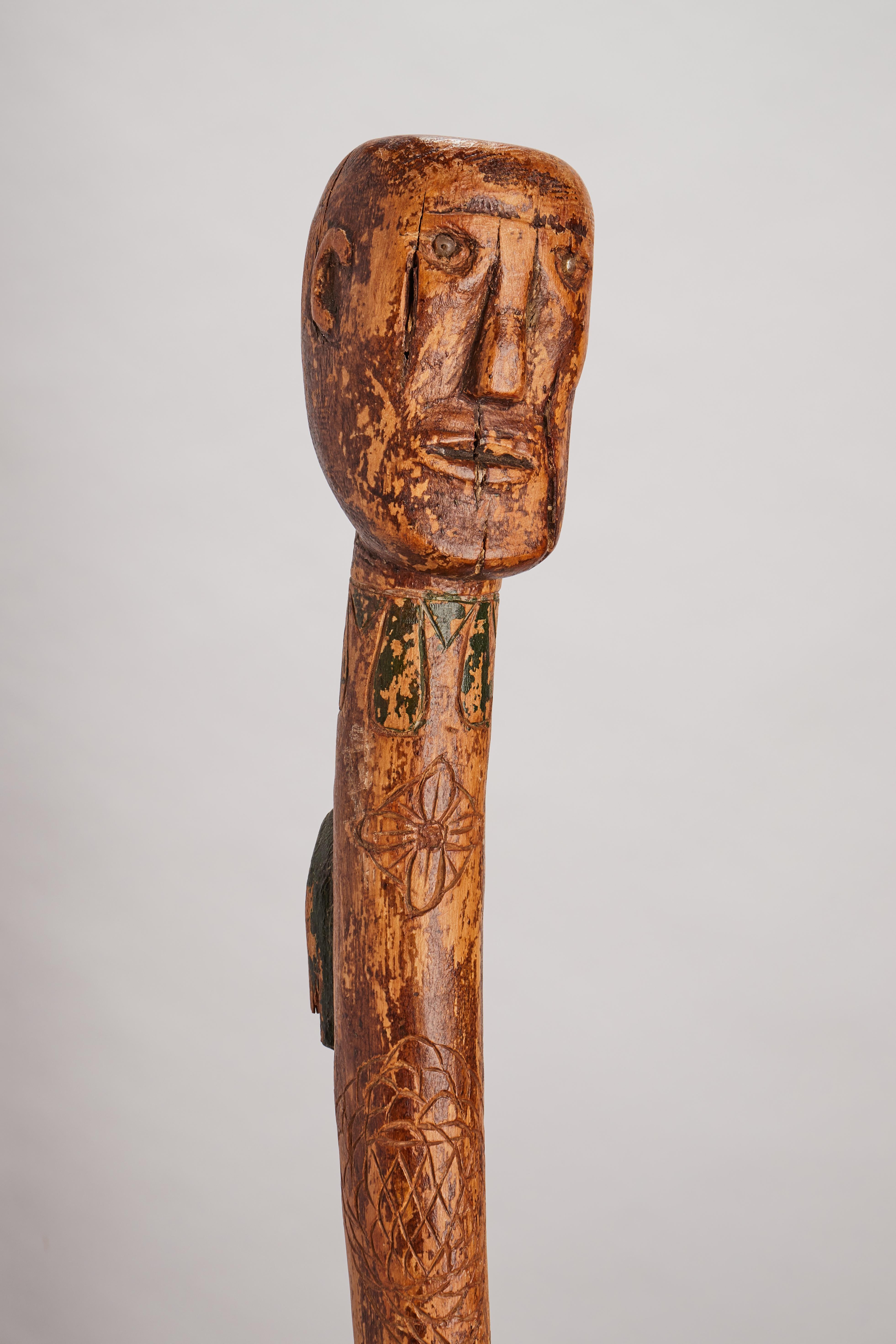 Folk art  walking stick depicting thehead of a man with a snake, USA 1880. For Sale 2