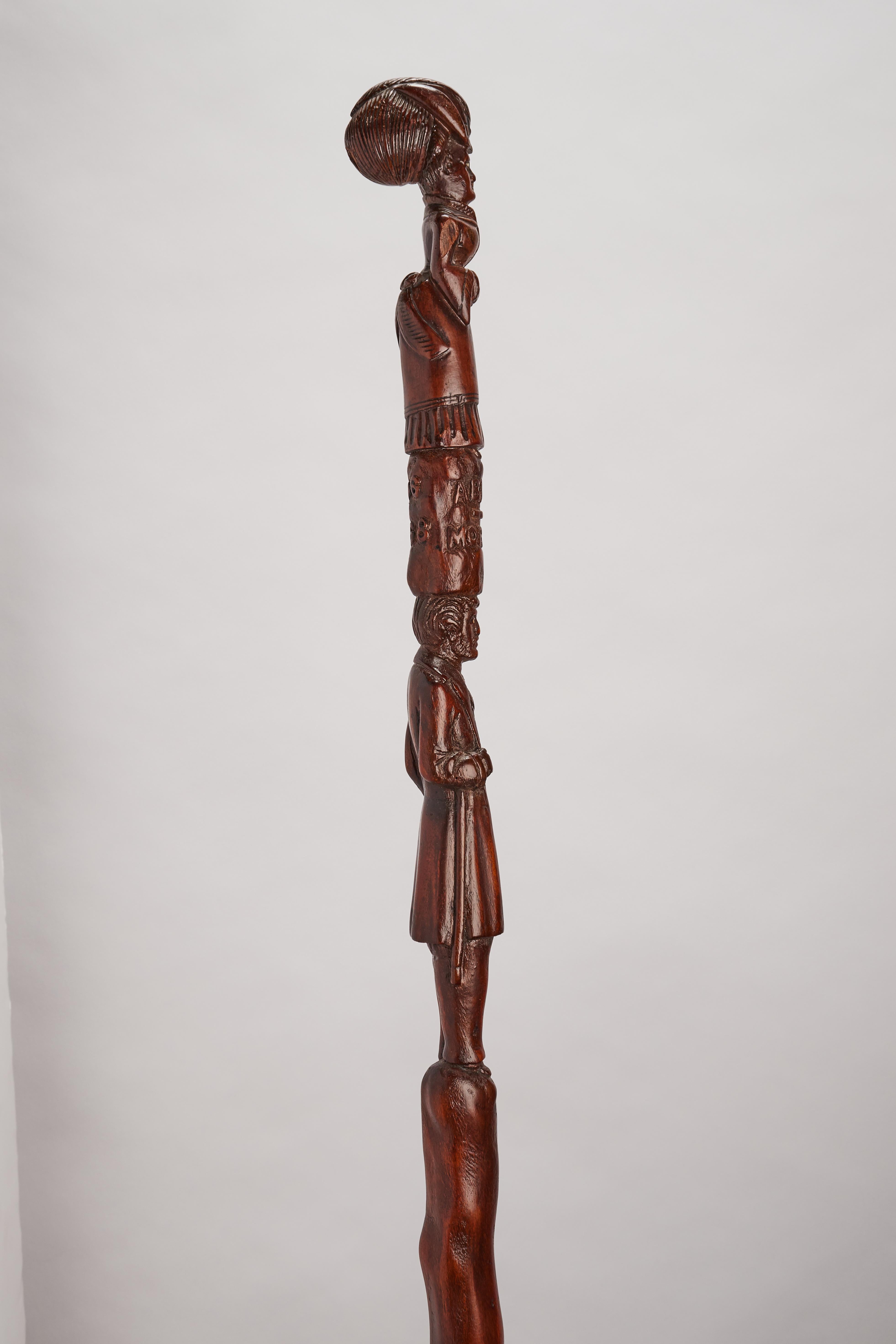 Folk Art walking stick: one piece of carved walnut wood. Original patina. The cane tells us that Ms. Abigale and Mr. Morgan got married on 6/6/1868 both of them elegant and carefully dressed, both of them with a hat Abigale in her head, with a