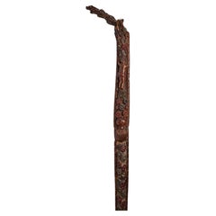 Folk art walking stick depicting flowers and characters, Russia circa 1830.