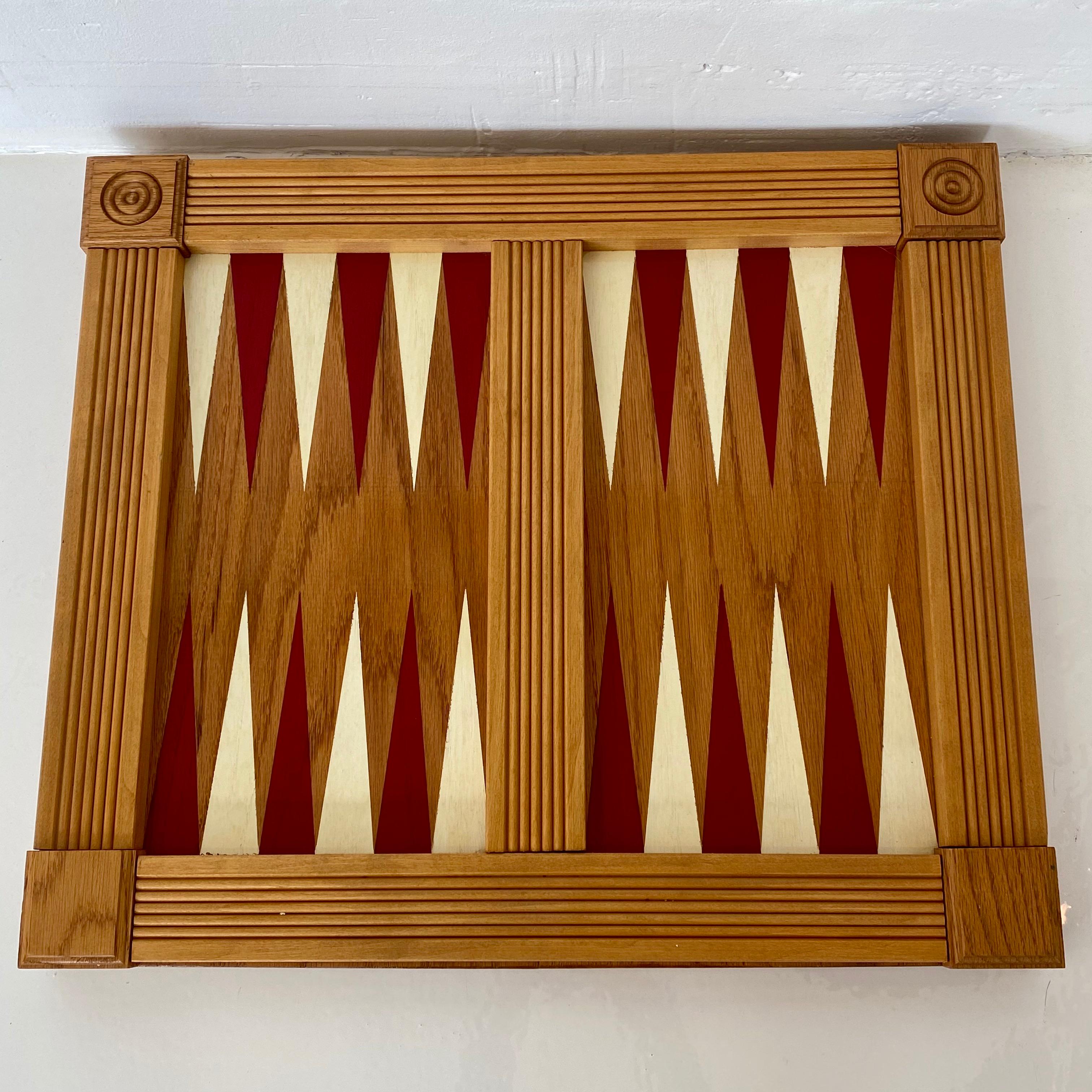 Vintage backgammon board. Heavy wood board made by hand. Hand painted triangles in red and white. Good vintage condition.