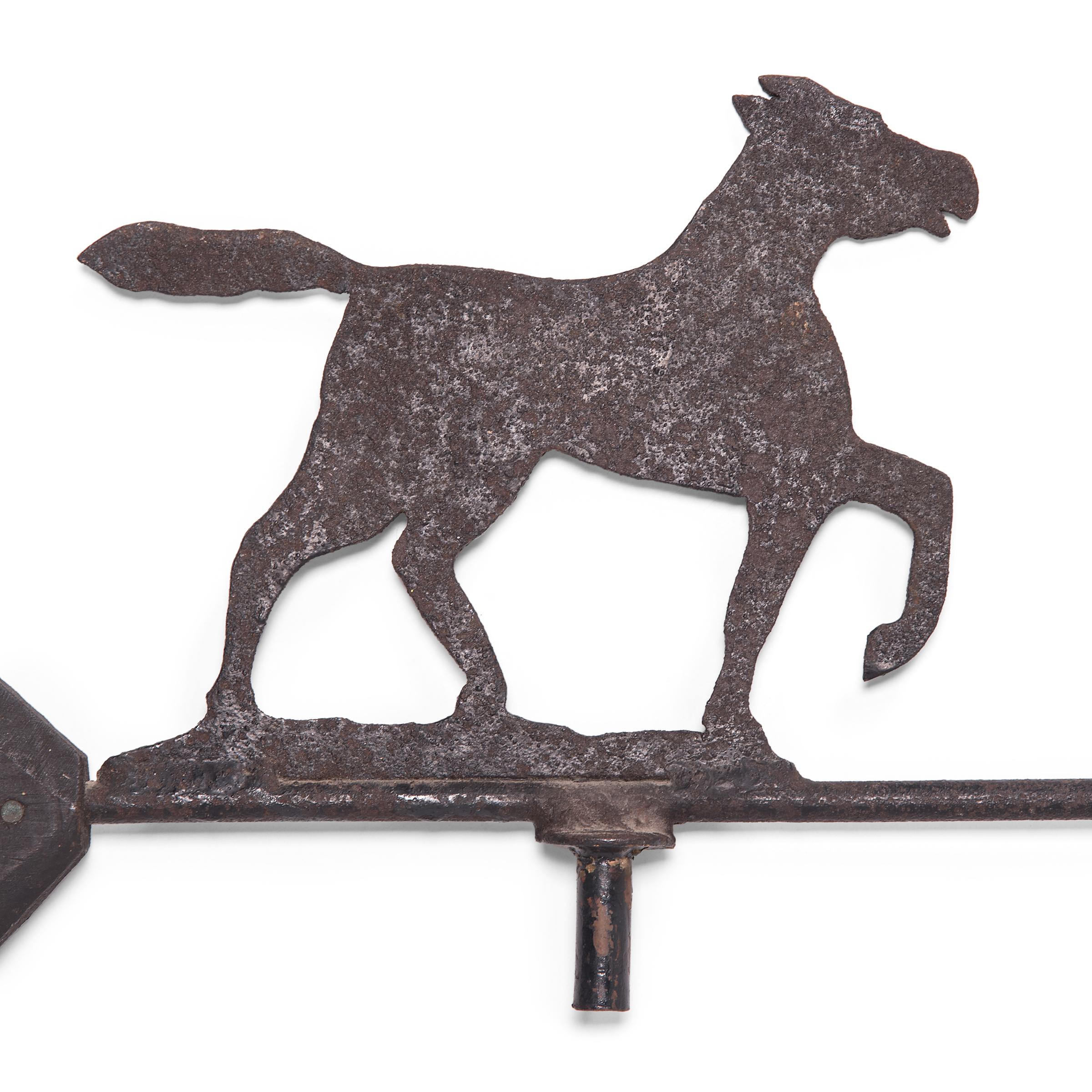 With a simple Silhouette and rich surface texture, this early 20th century metal-cut weathervane is a charming example of American Folk Art. Adding a decorative touch to the topmost point of a building, weathervanes were an opportunity to tell a