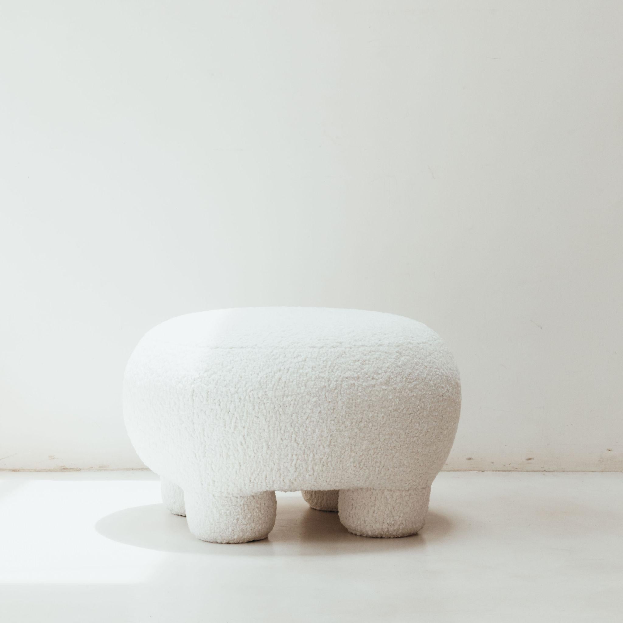 Folk Pouf by David Del Valle
Dimensions: D 70 x W 70 x H 40 cm.
Materials: French bouclet fabric.

DAVID VALLE
We are a place, a space, a woven chair, the dreams of a craftsman, the pride of a worker, we are a way of thinking, we are moldable and we