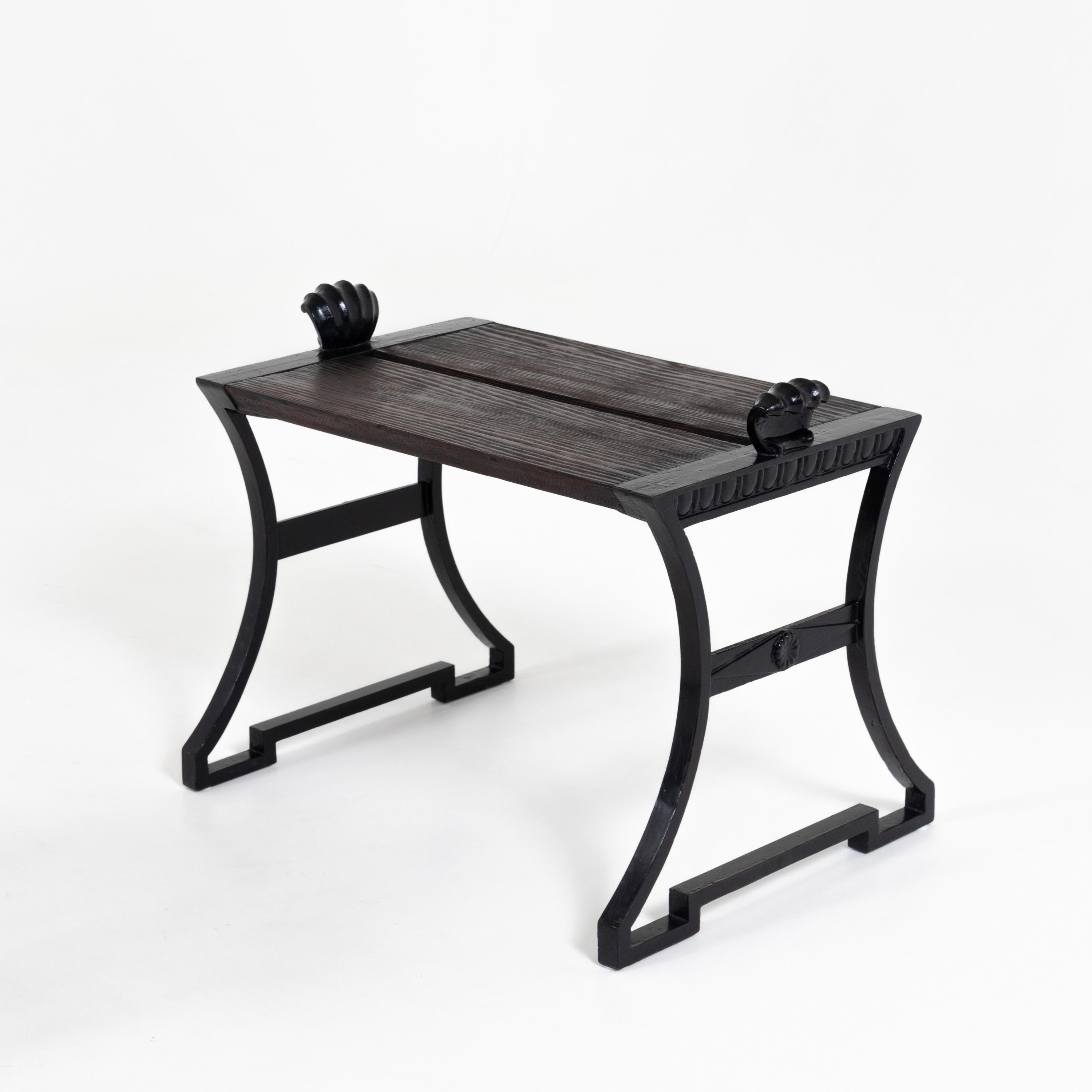 Pair of Folke Bensow (1886-1971) stools in black lacquered iron by the Näfveqvarn foundry and dark stained wood. Provenance: Ex collection Karl Lagerfeld.