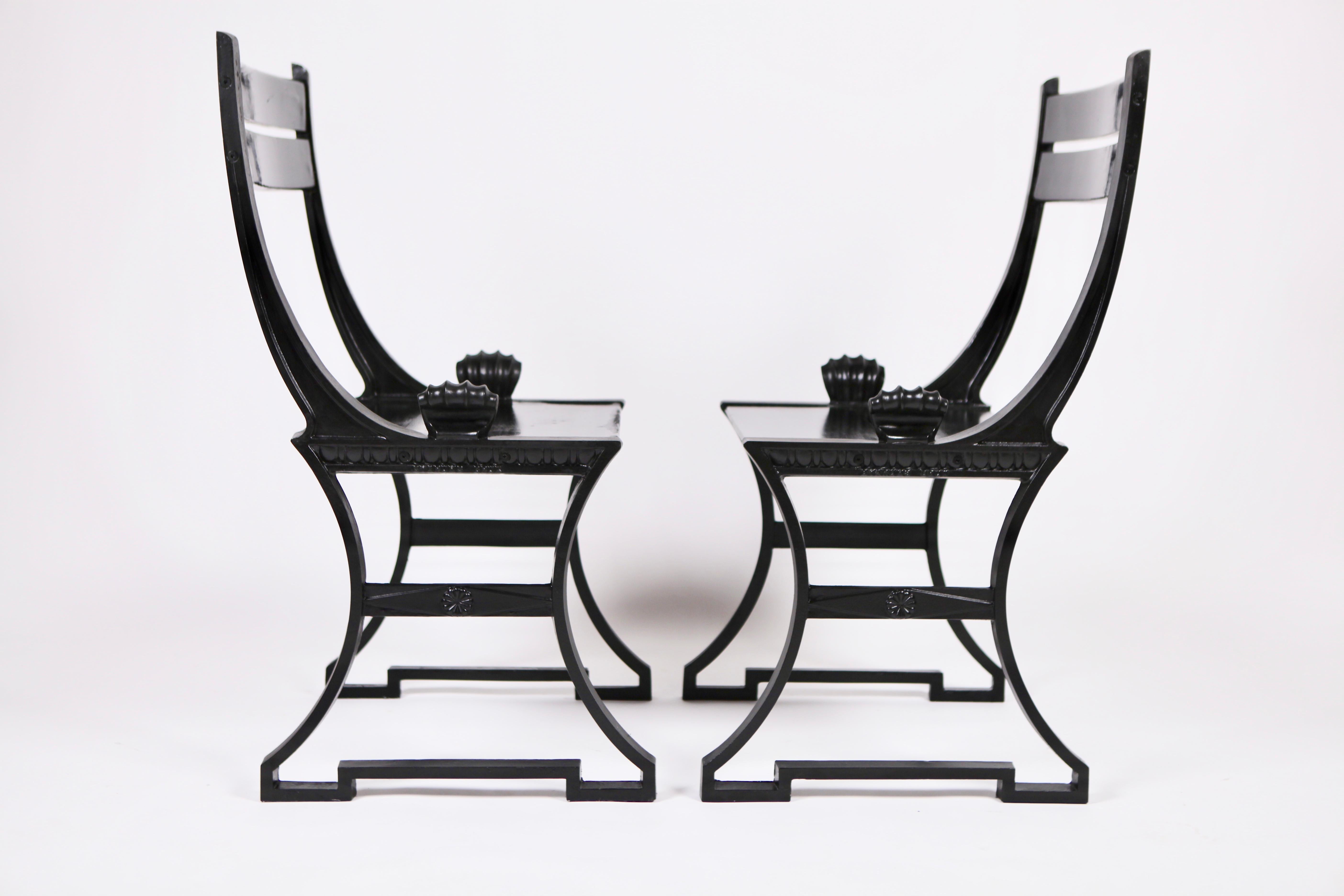 A pair of black chairs designed by Folke Bensow, executed in blackened cast aluminium and black lacquered wood in Sweden the 1980s.
Refinished, ready for use.
 