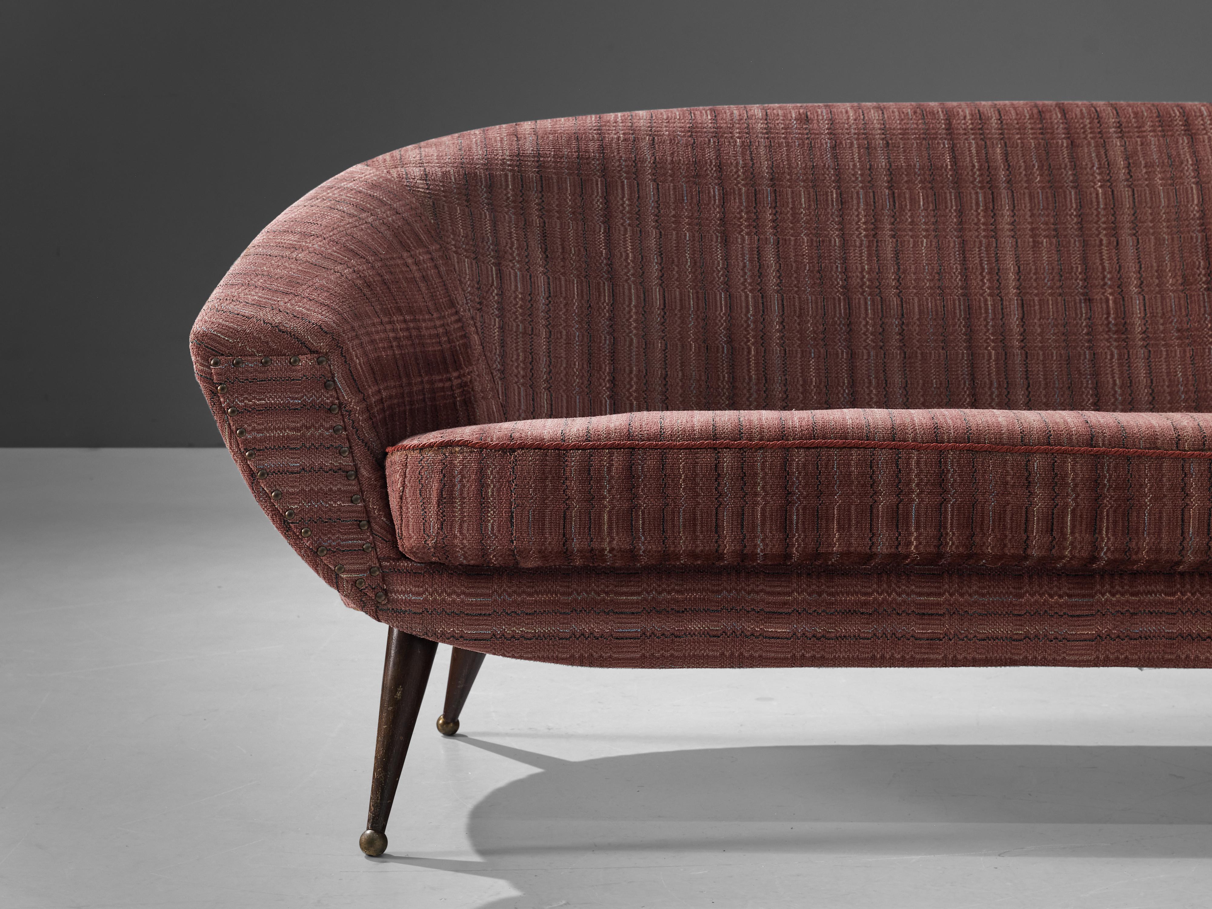 Folke Jansson, sofa model 'Tellus', fabric, wood, brass, Sweden, 1956.

Exquisite sofa designed by the Swedish designer Folke Jansson, featuring graceful lines that captivate the eye. Four subtly carved wooden legs are adorned with a touch of brass