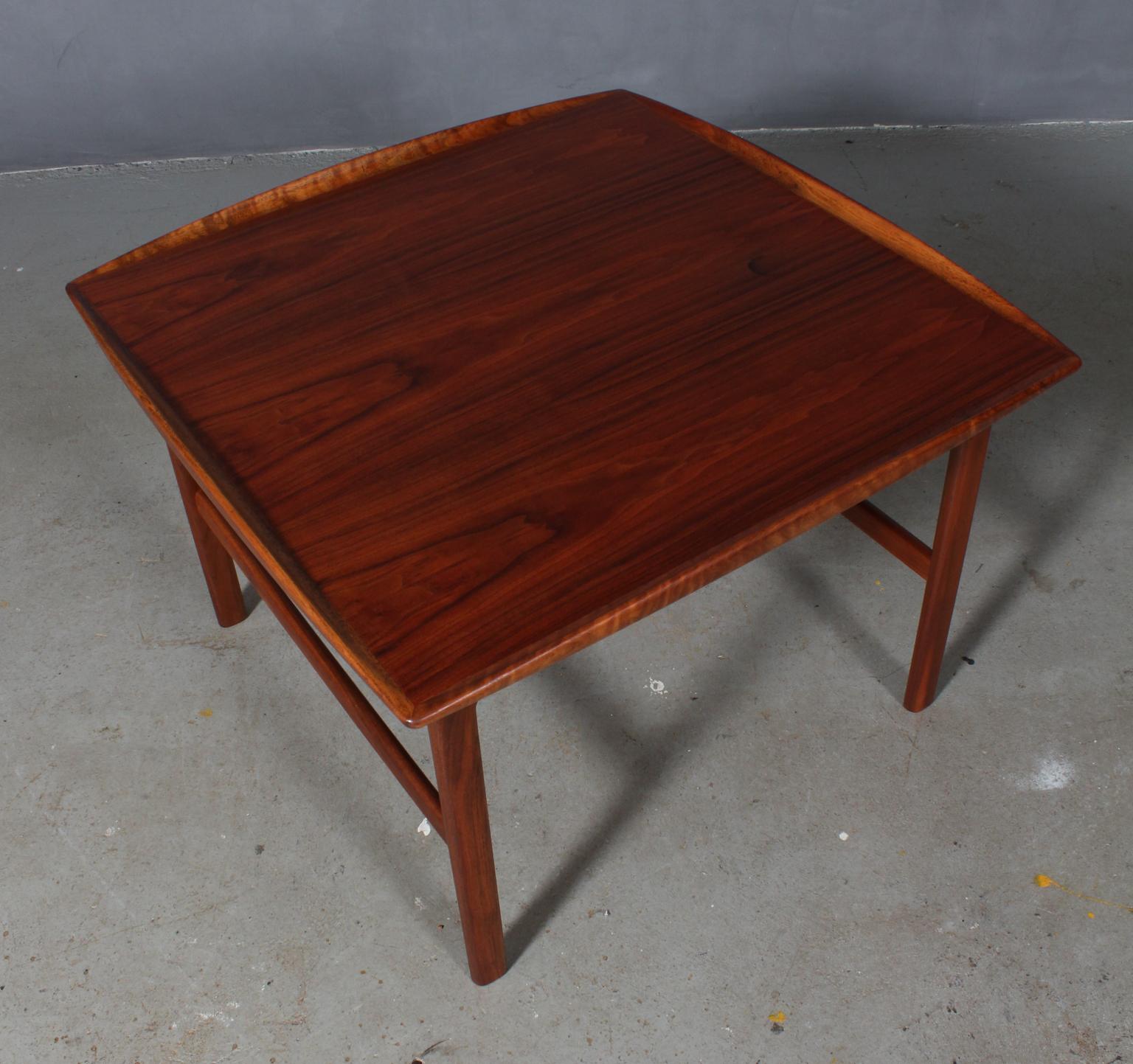 Folke Ohlsson coffee table in partly solid teak. 

Model Frisco, made by Bra Bohag for Tingströms.