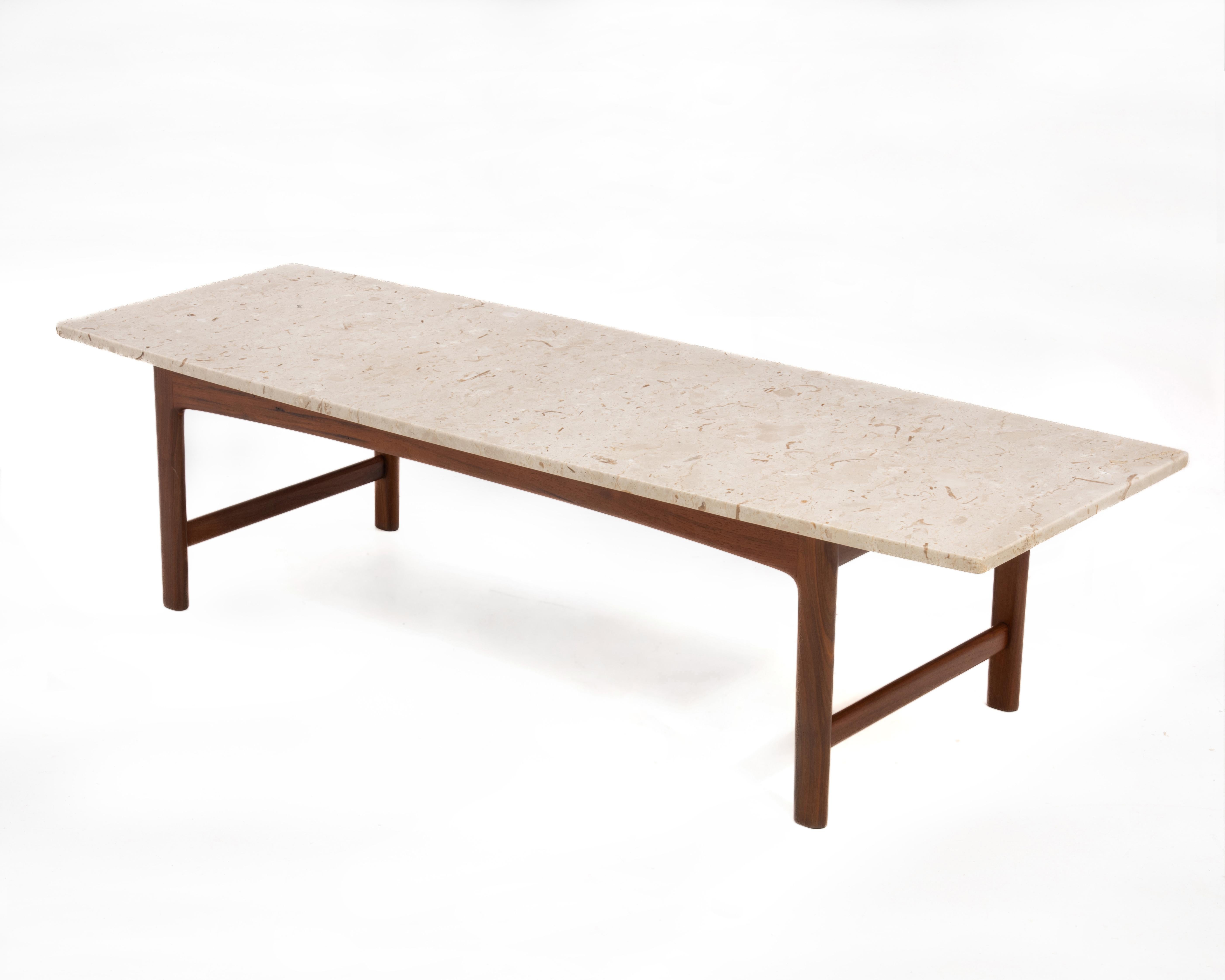 Folke Ohlsson for DUX of Sweden Mid Century travertine coffee table on a solid teak base. The substantial rectangular travertine top is beautifully figured. The travertine top floats on a clean, stable and strong teak base. Fully marked, the table