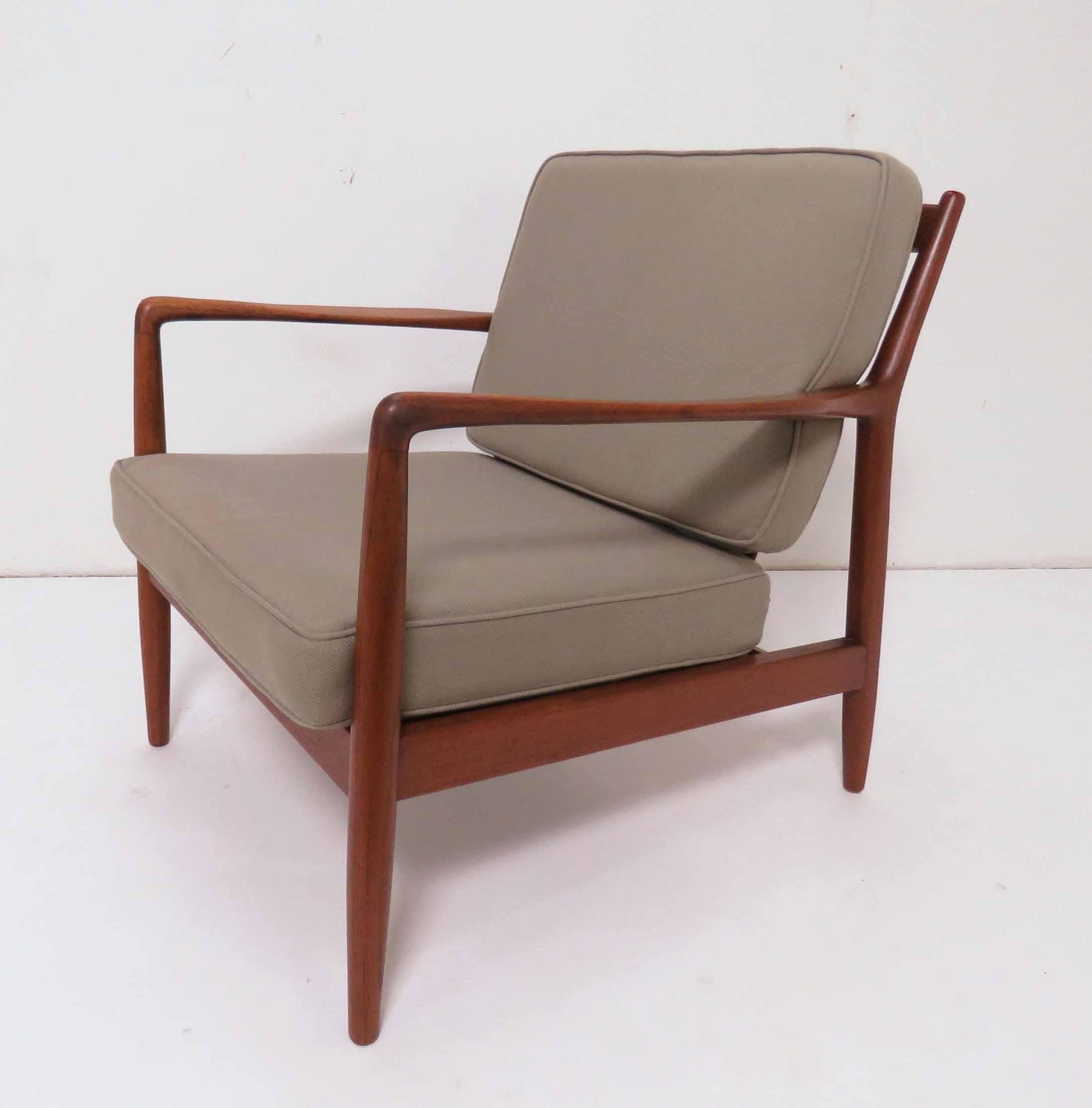 Classic teak lounge chair, designed by Folke Ohlsson for DUX, made in Denmark, circa 1960s.