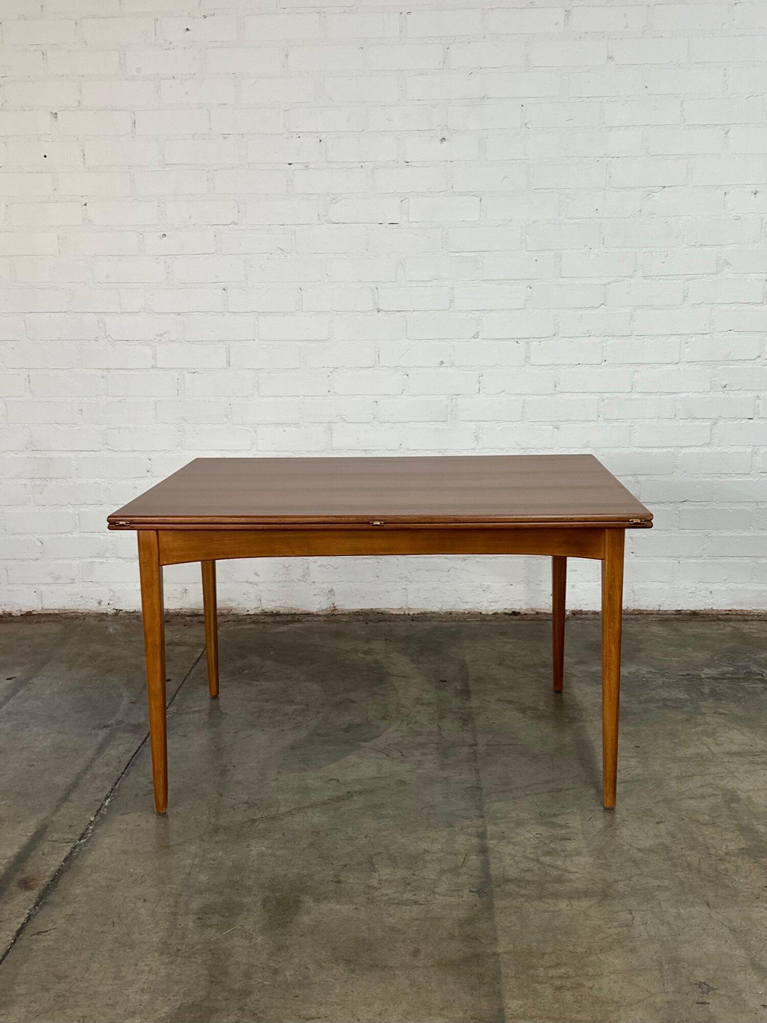 W47.5 D35.5 H28.5 KC26.5

Folding dining table with exceptional grain surface. Item has been fully restored and shows well with no major areas of wear. Surface opens and closes smoothly. 

