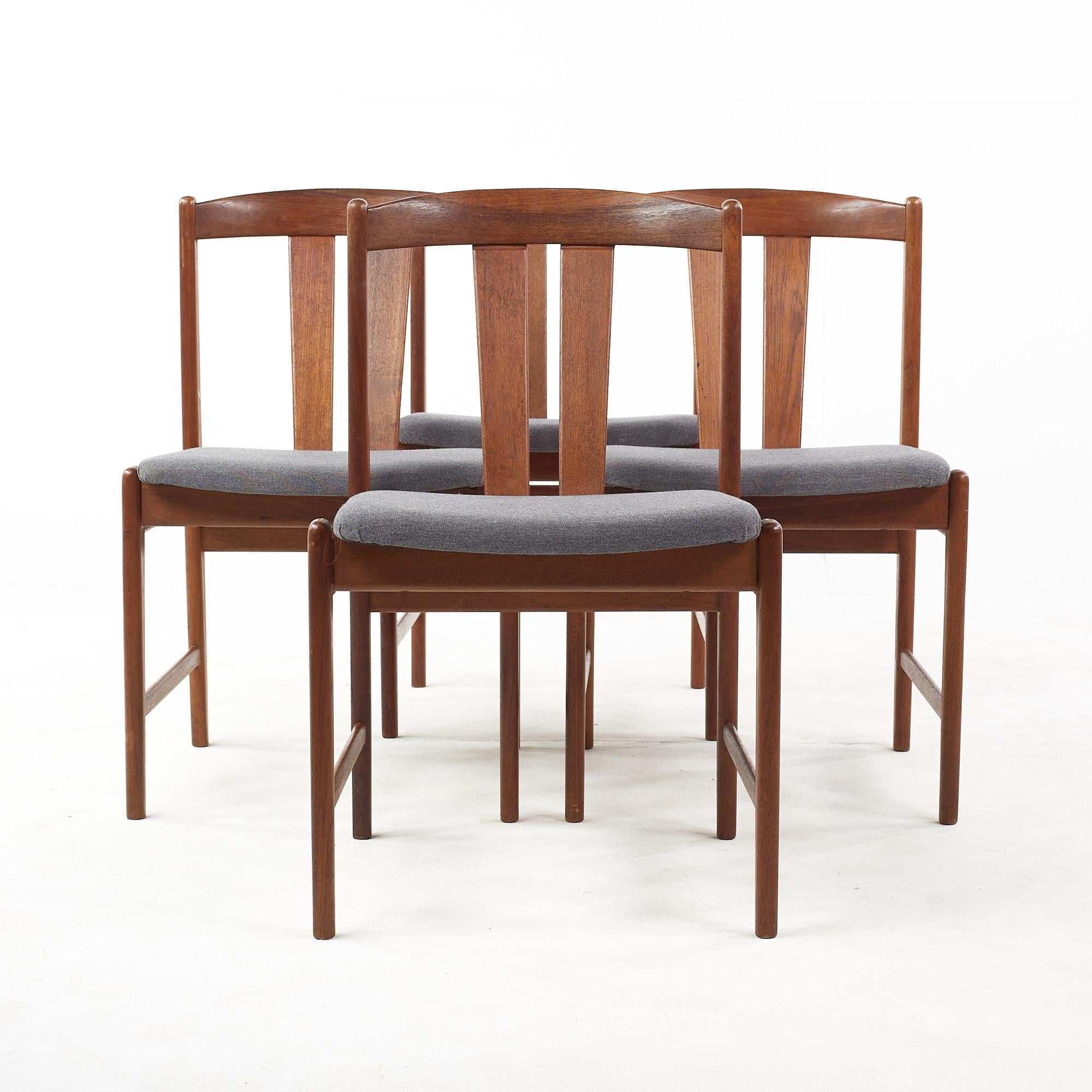 Folke Ohlsson for Dux Mid Century Teak Wishbone Dining Chairs - Set of 4

These chairs measure: 19 wide x 25 deep x 30 inches high, with a seat height/chair clearance of 18 inches

All pieces of furniture can be had in what we call restored vintage