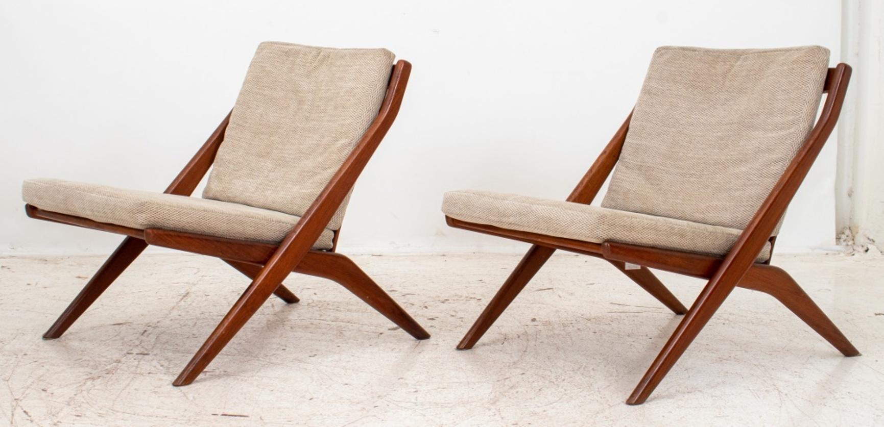 Pair of Folke Ohlsson (Swedish/American, 1919 - 2003) for Dux of Sweden teak scissor chairs, made in Sweden, marked. 27.5