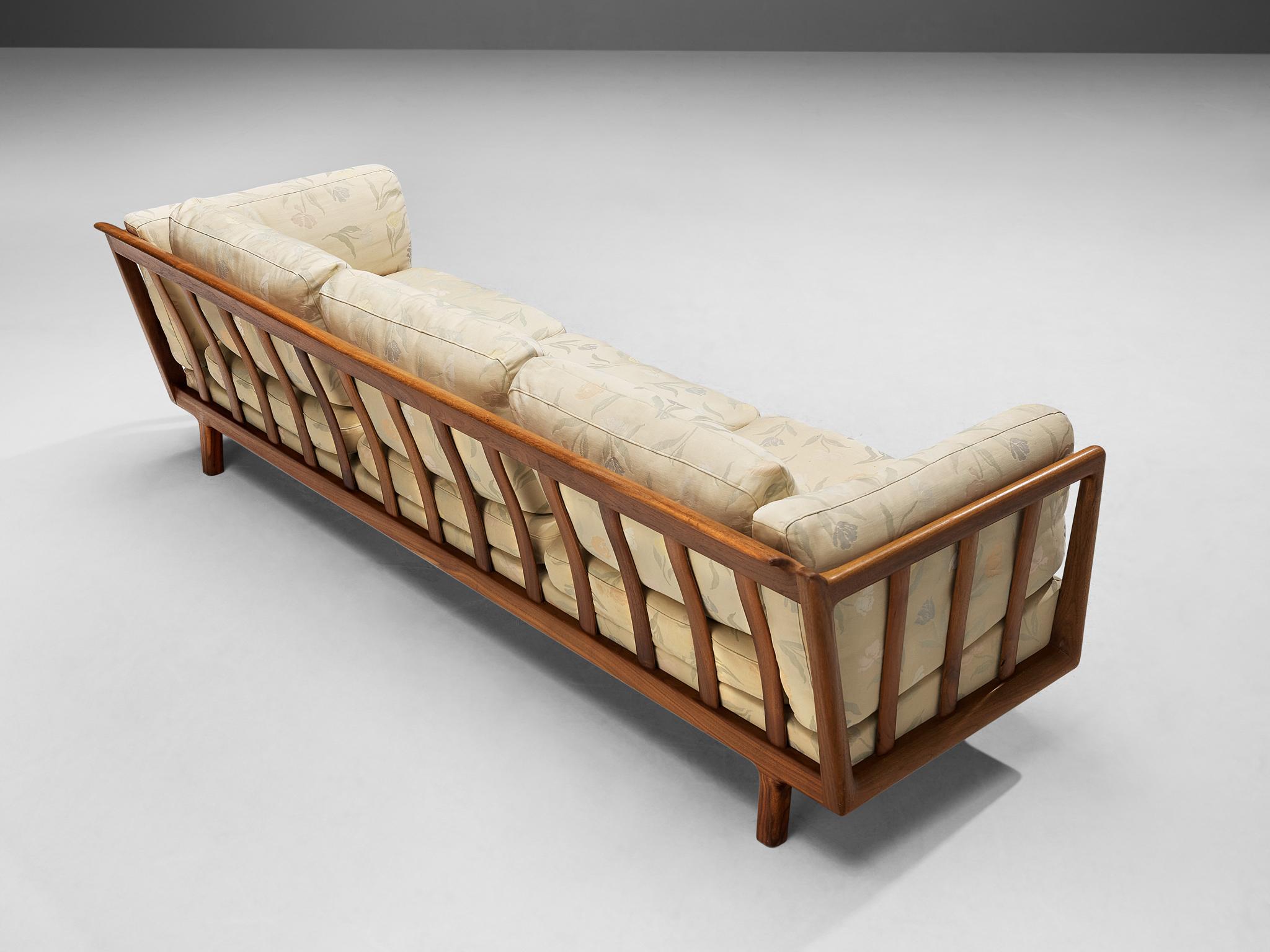 Folke Ohlsson for Dux of Sweden, sofa, teak, fabric, Sweden, 1960s

A beautiful and rare sofa designed by Folke Ohlsson in the 1960s. This three seat sofa has a stunning teak frame, with slats of rich colored wood around the back and sides. The sofa