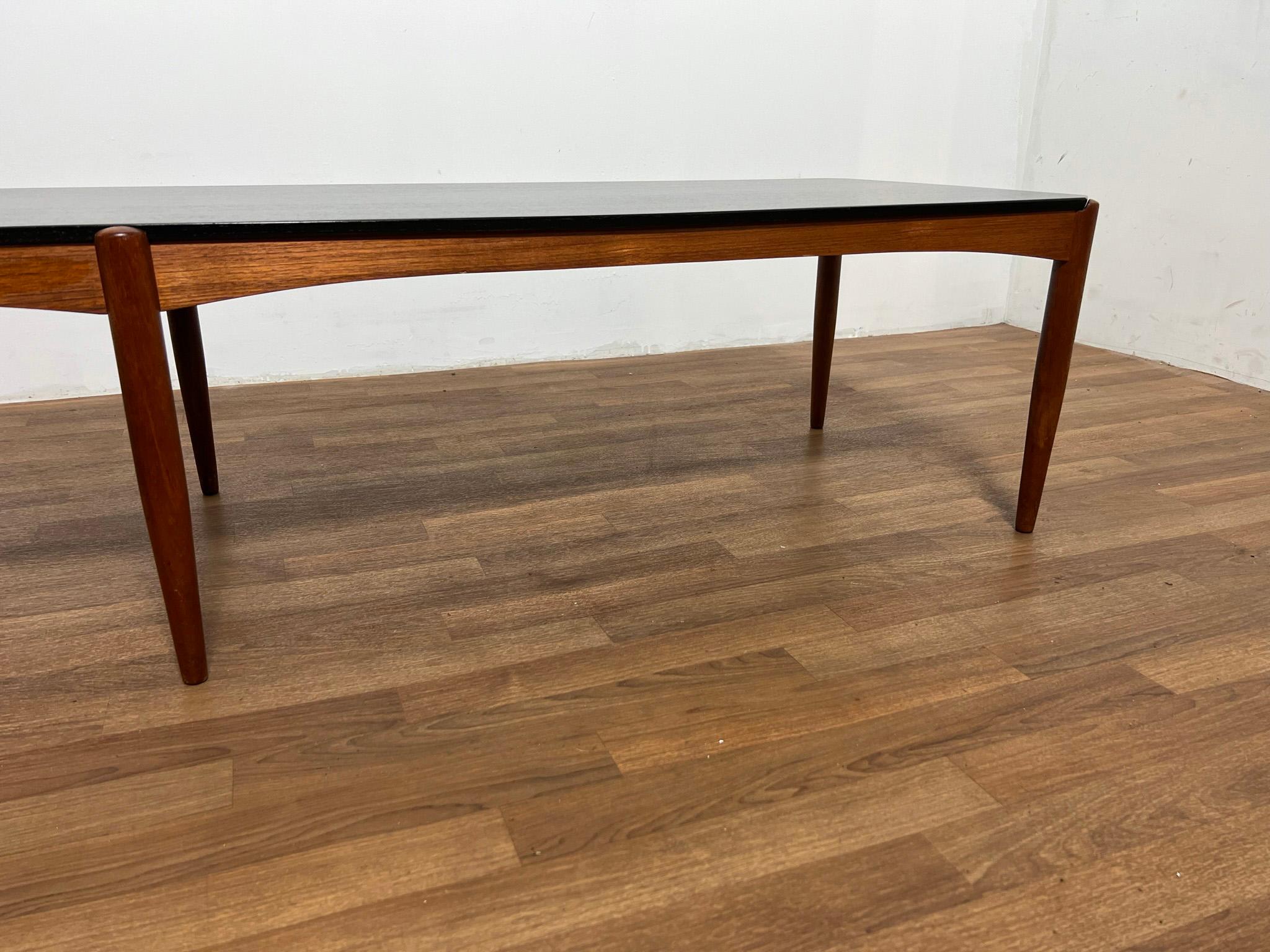 Mid-20th Century Folke Ohlsson for Dux Teak and Ebonized Bench Form Coffee Table, Sweden For Sale