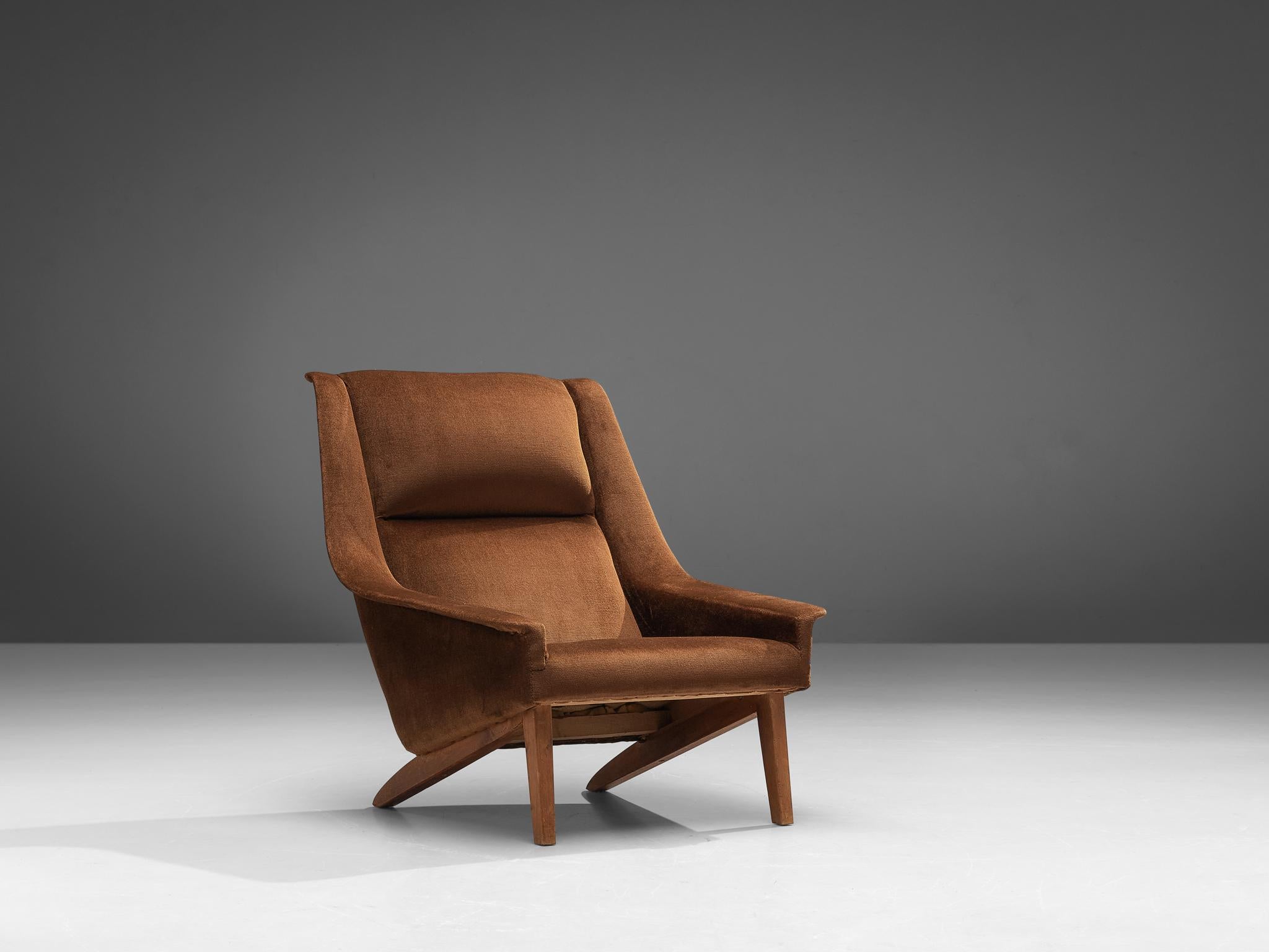 Folke Ohlsson for Fritz Hansen, lounge chair, model '4410', fabric, teak, Denmark, designed in 1957

Armchair by Folke Ohlsson made in Denmark in the 1950s. This high quality lounge chair is characterized by a stylish timeless design based on
