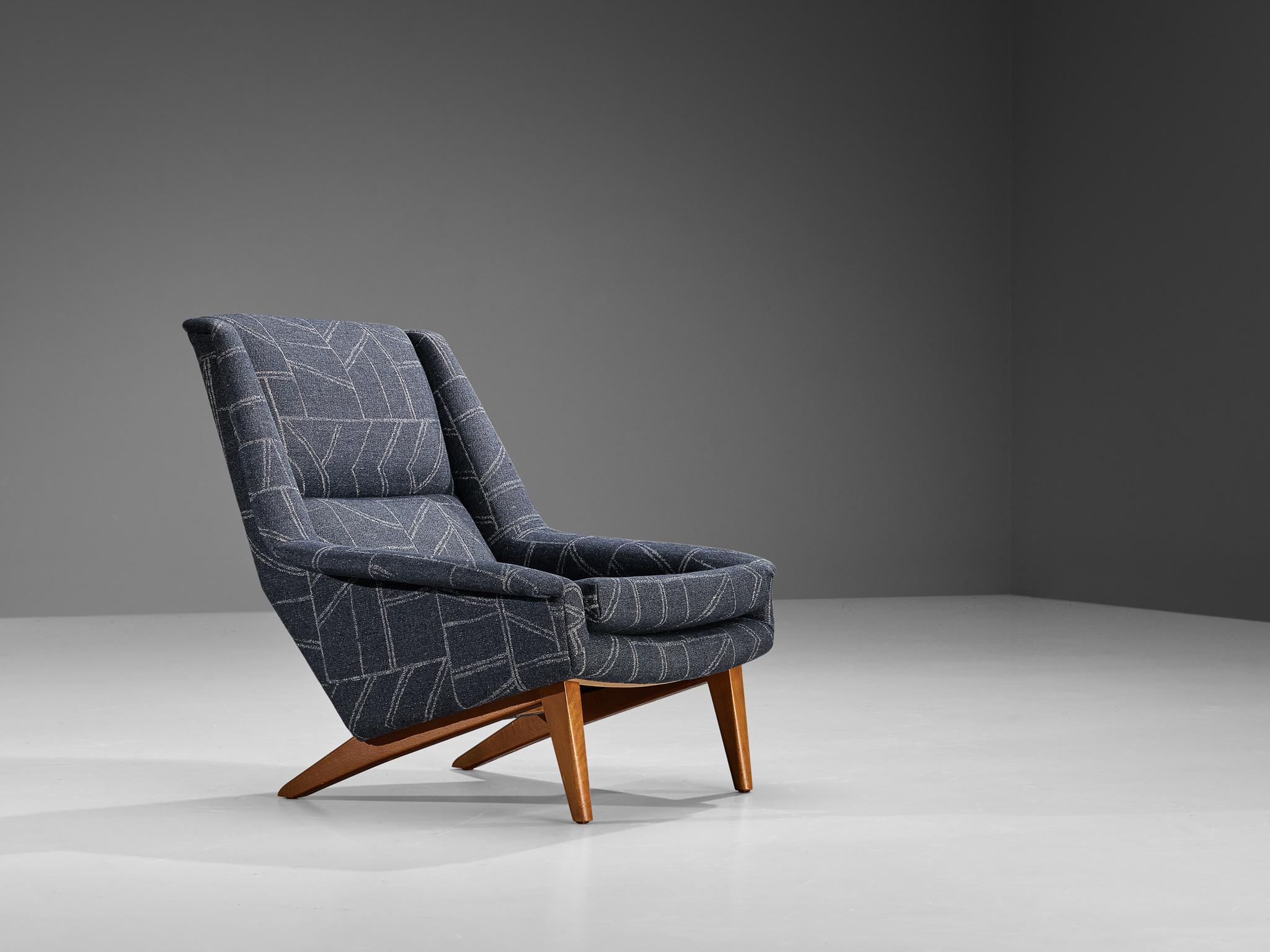 Folke Ohlsson for Fritz Hansen, lounge chair, model '4410', fabric, teak, Denmark, design in 1957

Armchair by Folke Ohlsson made in Denmark in the 1950s. This high quality lounge chair is characterized by a stylish timeless design based on elegant