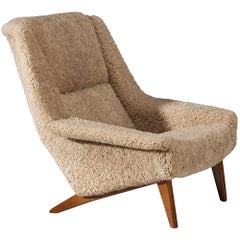 Fauteuil « Lounge Chair » de Folke Ohlsson pour Fritz Hansen, en peau de mouton