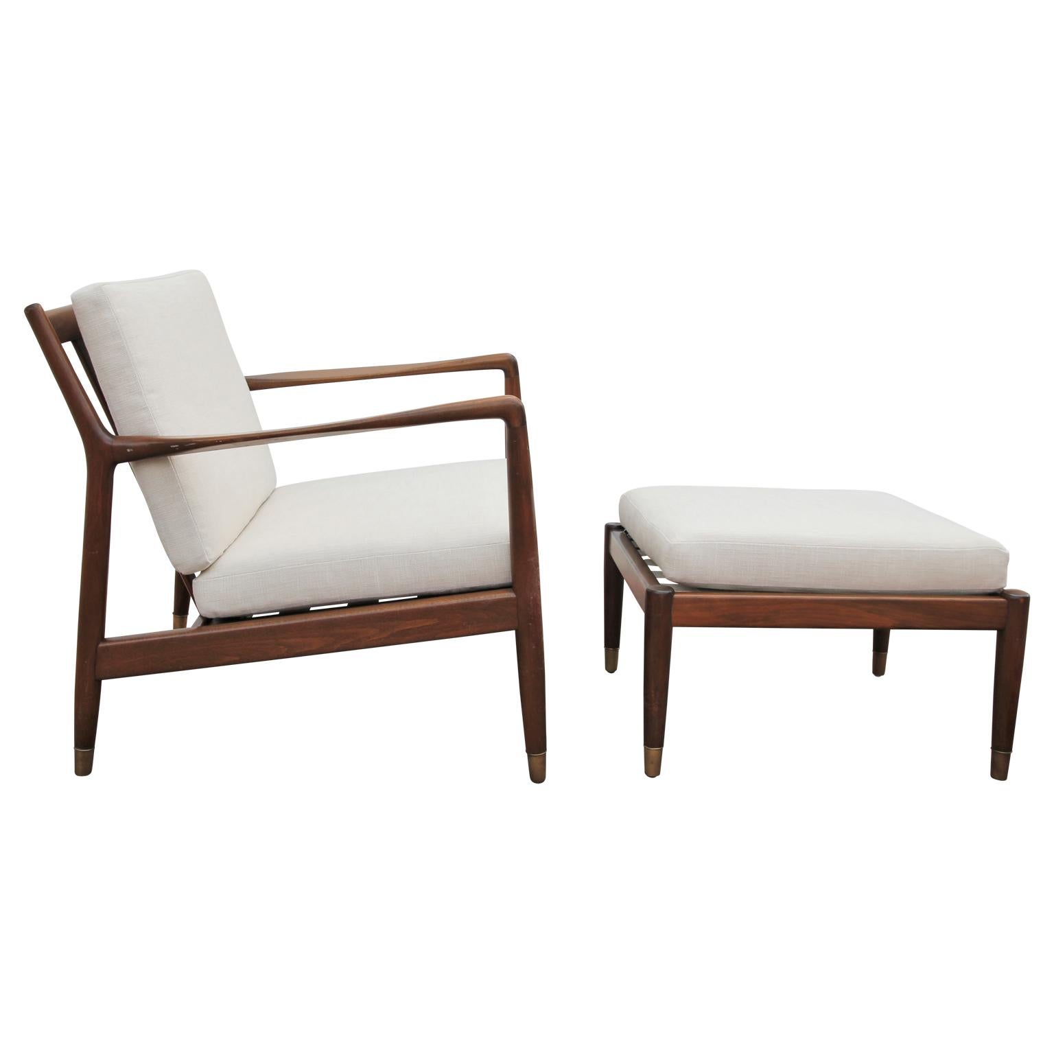 Folke Ohlsson Model 75-C walnut color Danish modern lounge chair for DUX
New indoor outdoor stainproof fabric from Kravet.
Chair dimensions: H 28 in. x W 27 in. x D 26 in. 
Seat height: 15 in. 
Arm height: 23 in.
Ottoman dimensions: H 15 in. x
