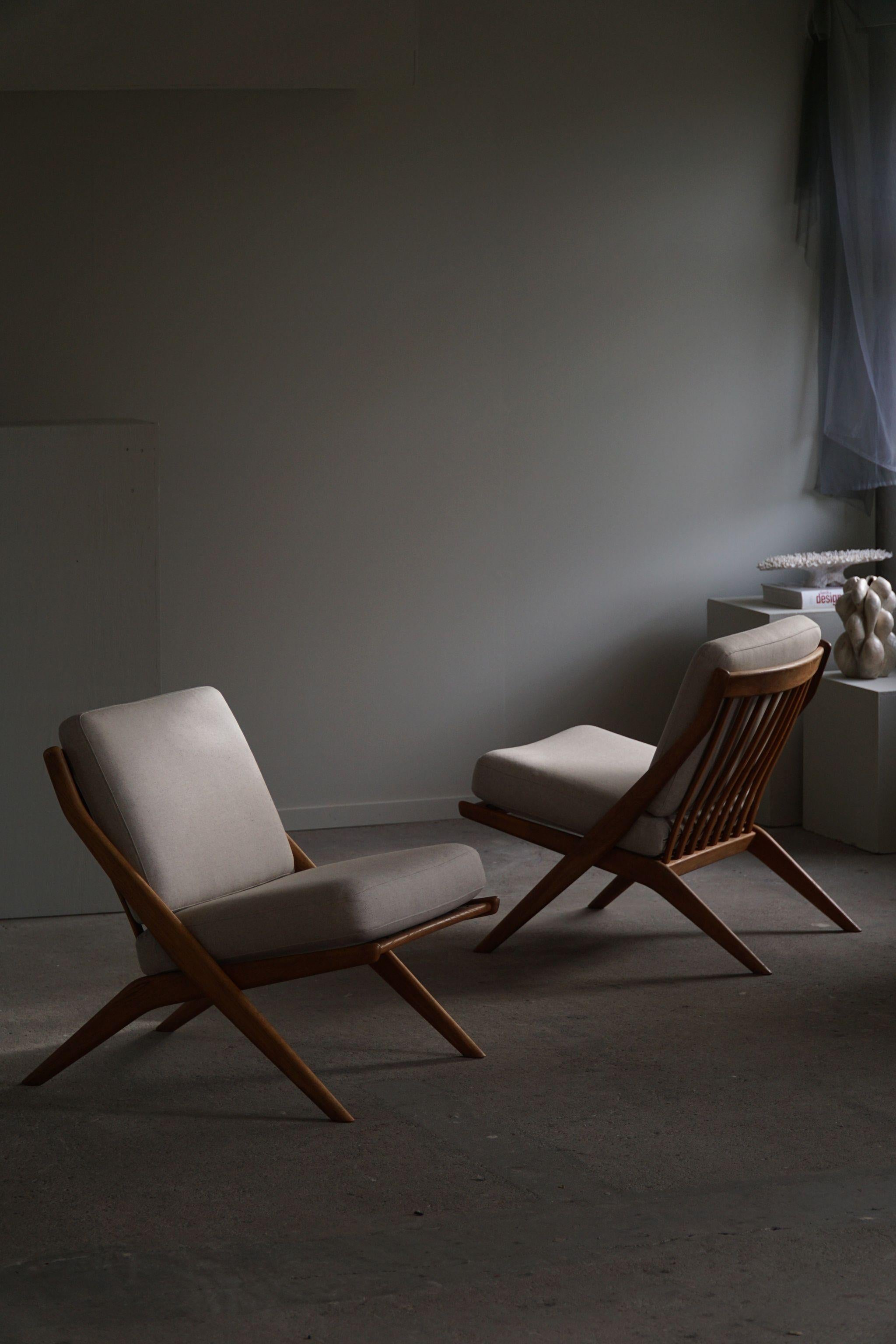 Folke Ohlsson. Pair of Lounge chairs, Model 