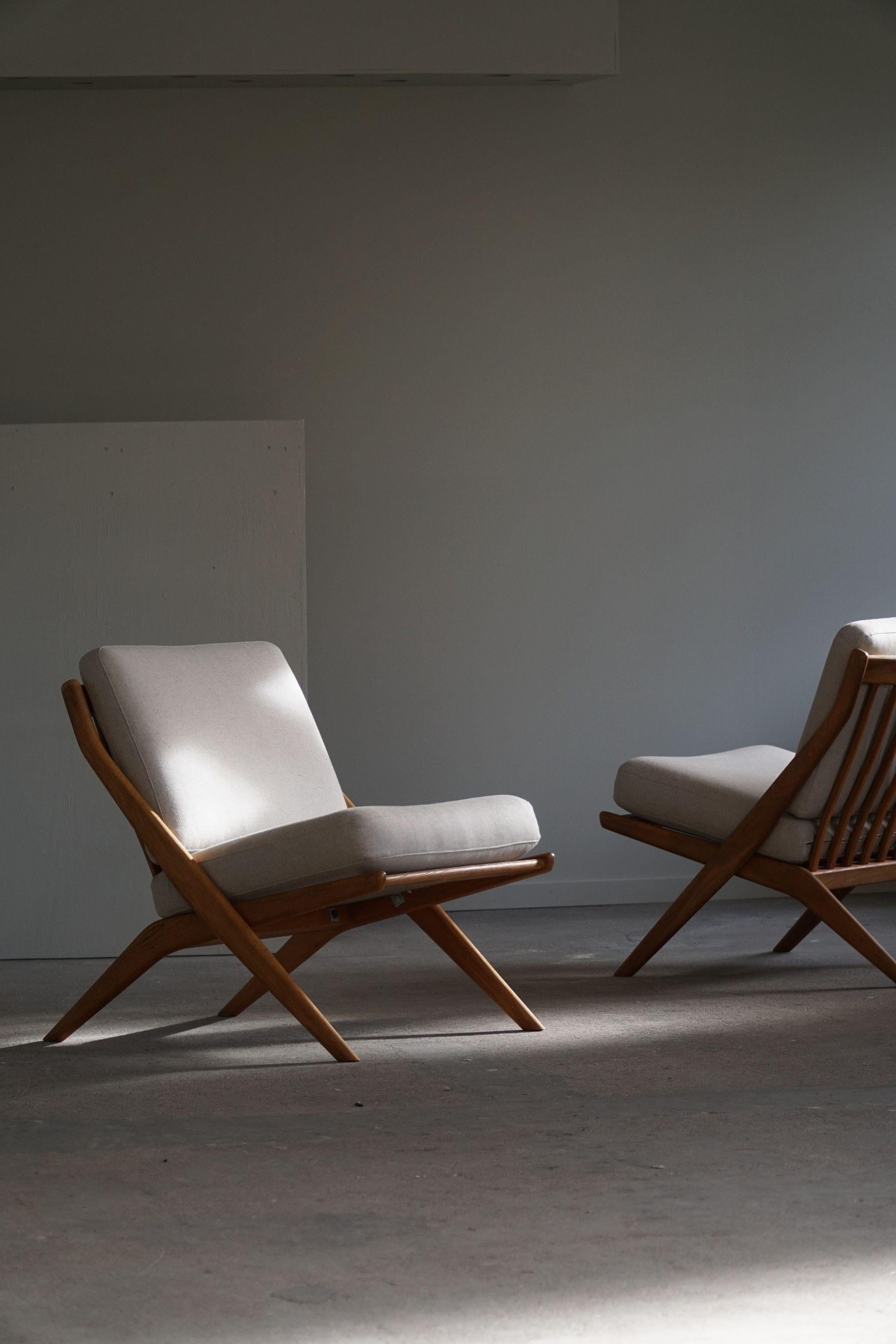 20th Century Folke Ohlsson. Pair of Lounge chairs, Model 